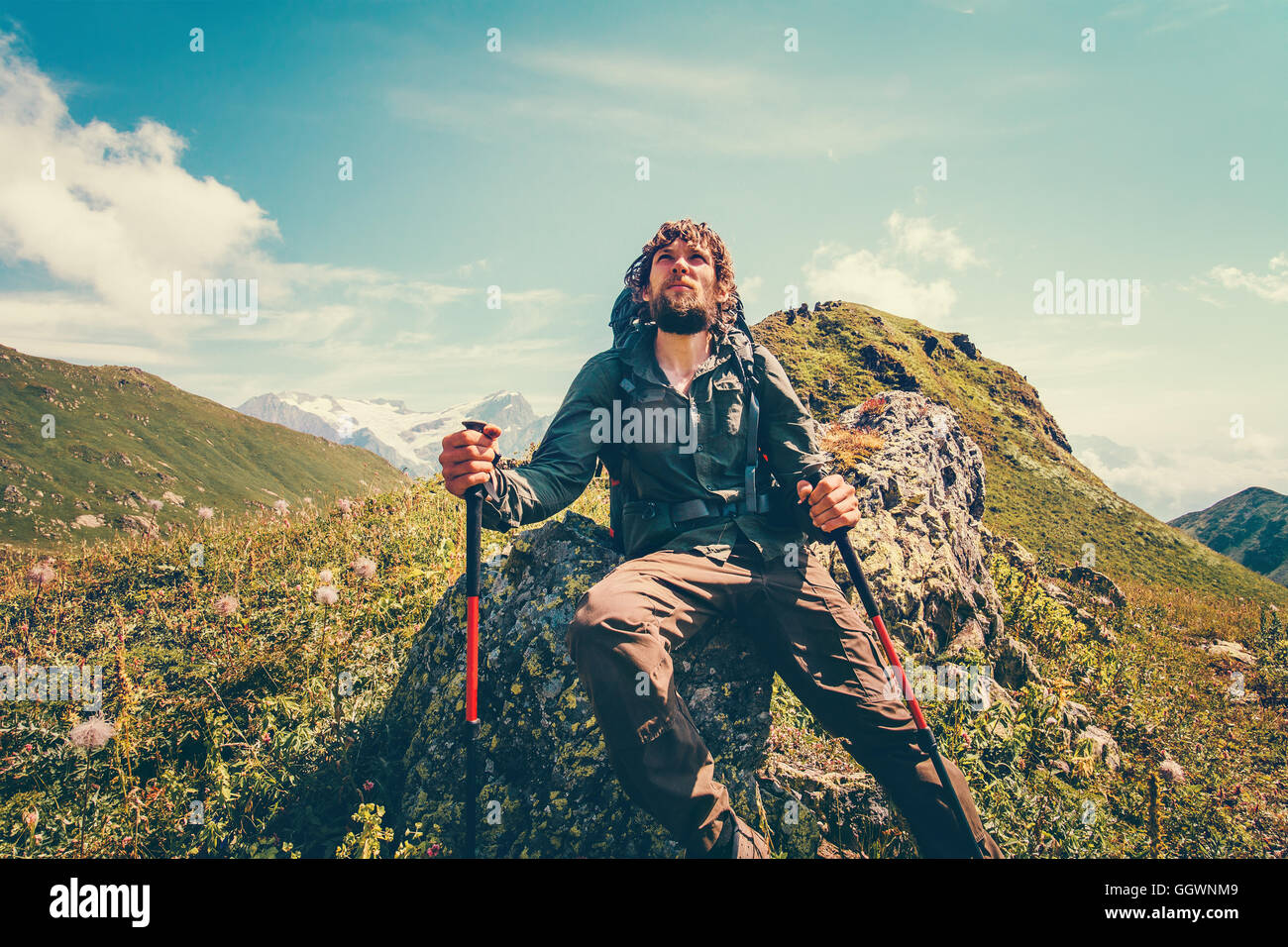 Boy traveler trekking poles hi-res stock photography and images - Alamy