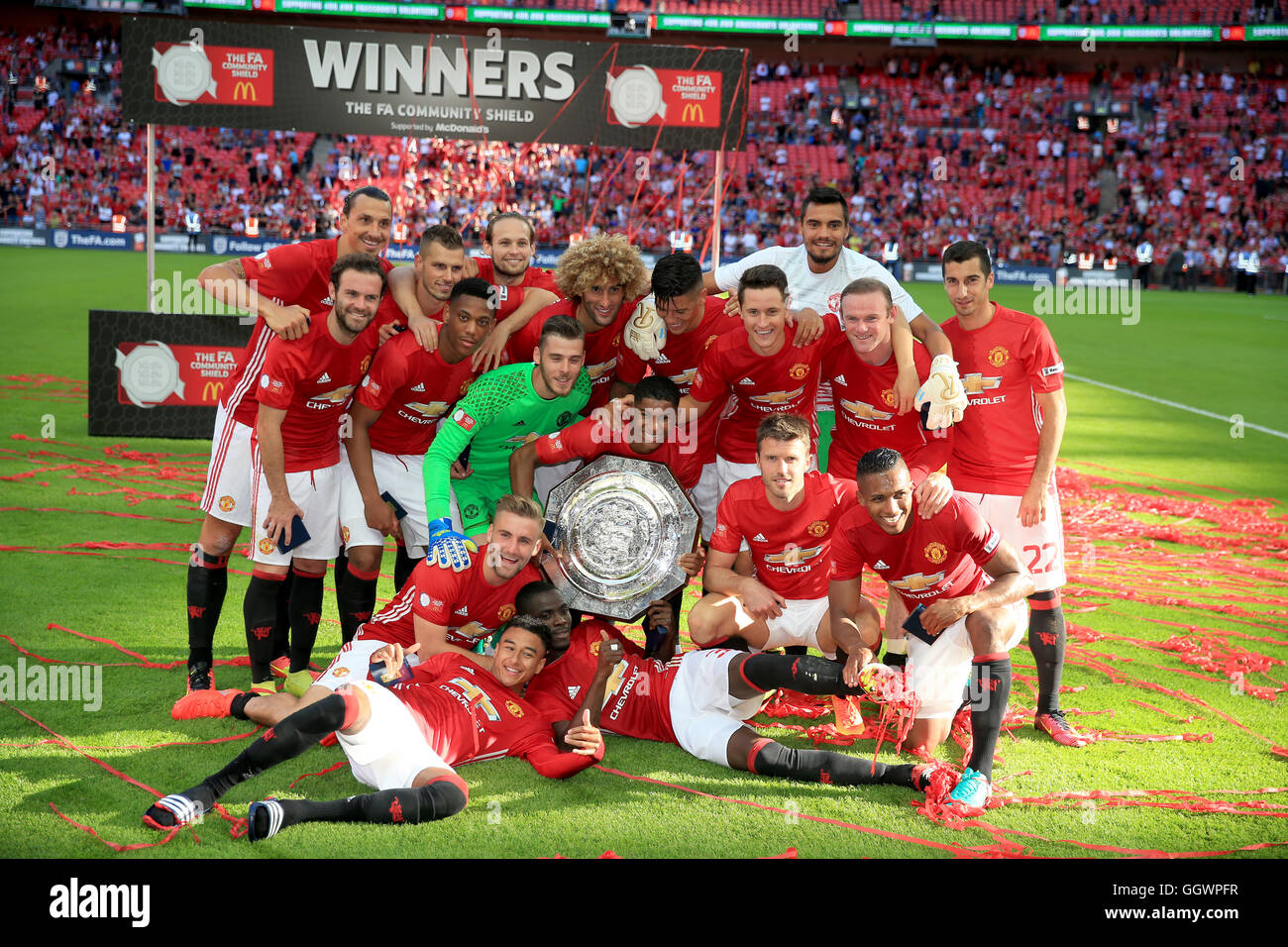 Manchester United Players Celebrate With The Community Shield After Stock Photo Alamy