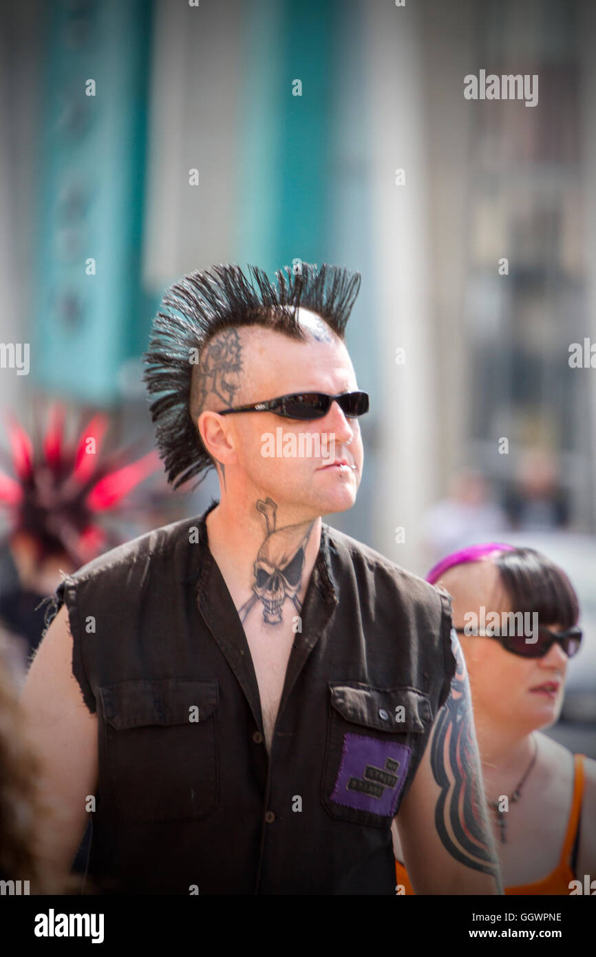 A punk rock rebel rebelling rebellion Blackpool festival spike spiked spiky mohican mohawk with black hair,  hairstyle outlaw steampunk rock rocker Stock Photo