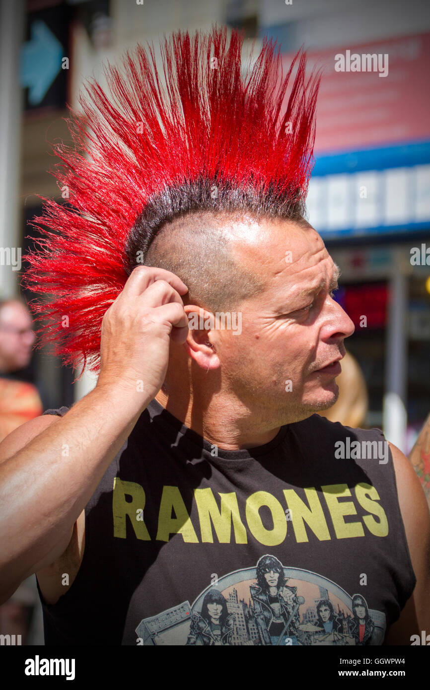 a punk rock rebel rebelling rebellion Blackpool festival spike spiked spiky mohican mohawk hair hairstyle outlaw steampunk doc martens rock rocker Stock Photo