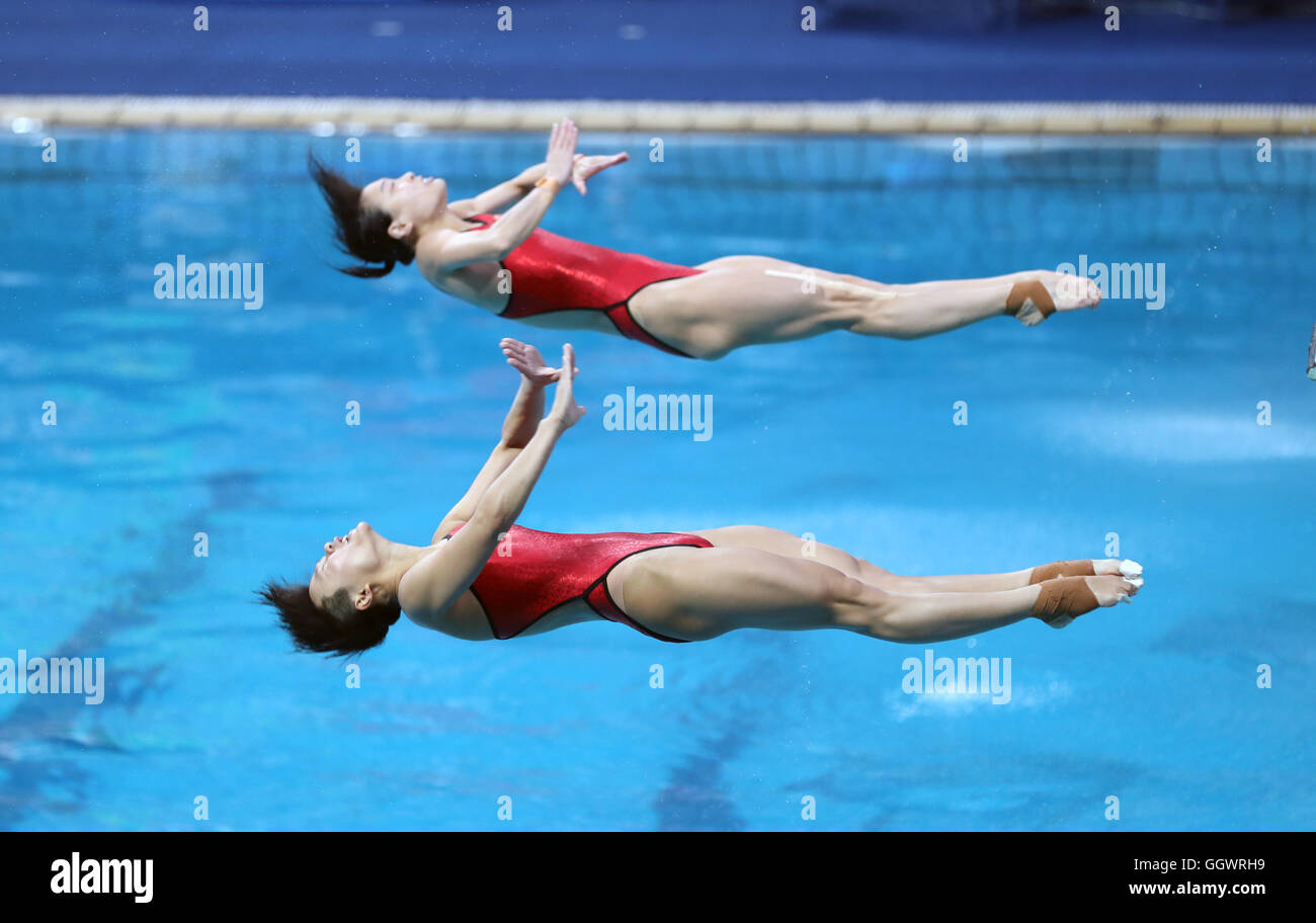 China's Shi Tingmao and Wu Minxia take gold in the Women's 3m Springboard final on the second day of the Rio Olympics Games, Brazil. Stock Photo