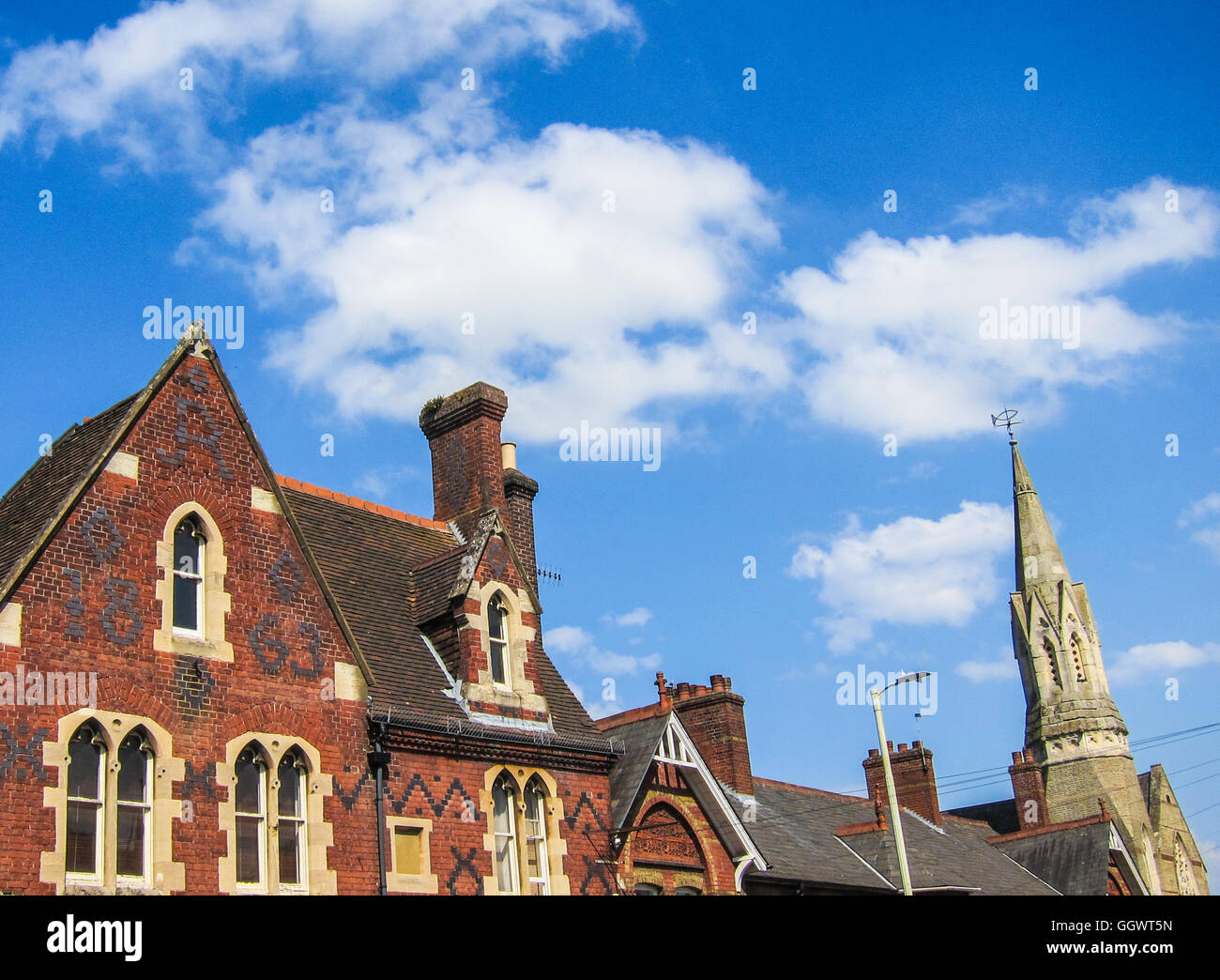 A former dwelling, now with shop front on ground floor built in 1863