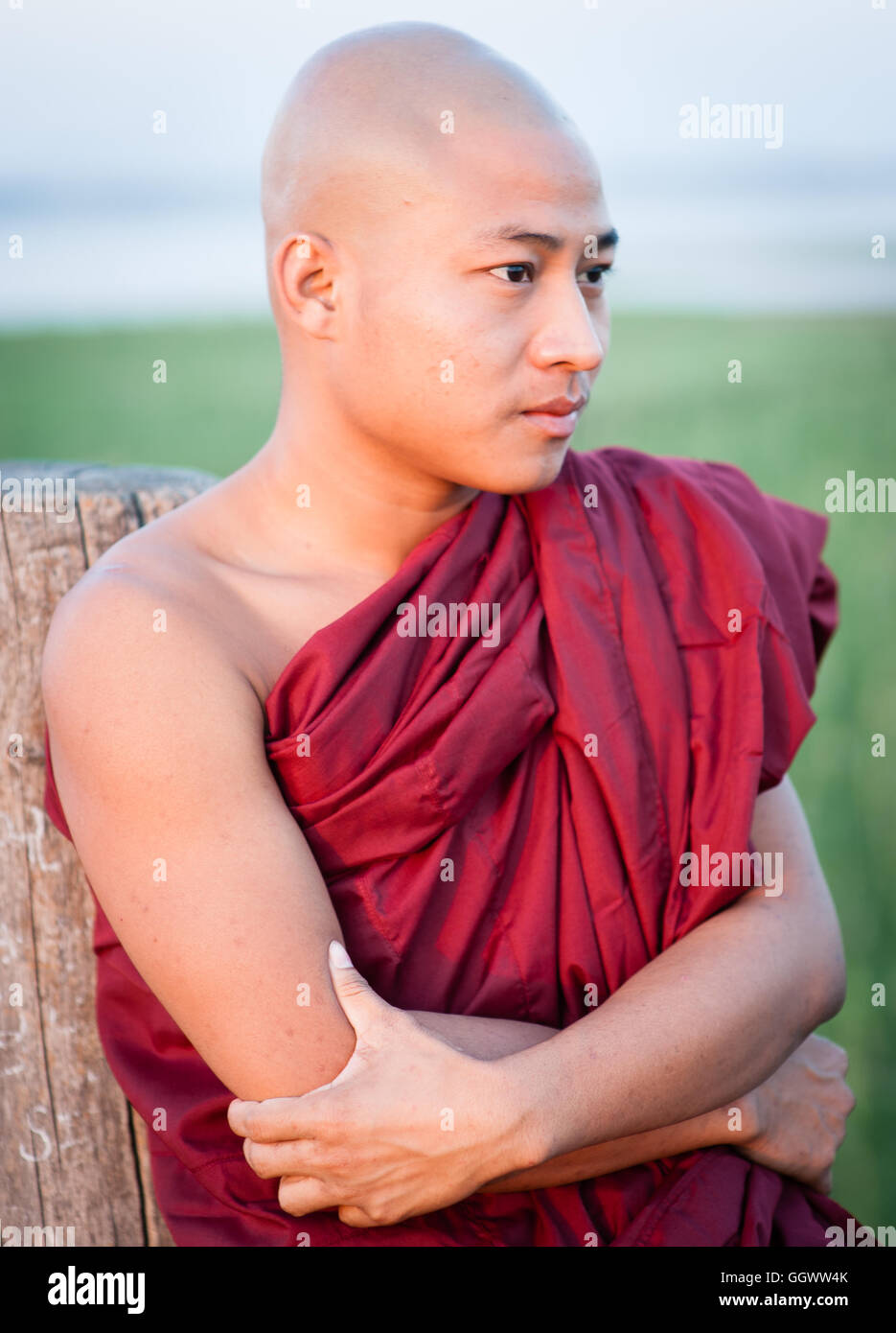 Asia buddhist maroon monk religion head shaven wrapped young hires
