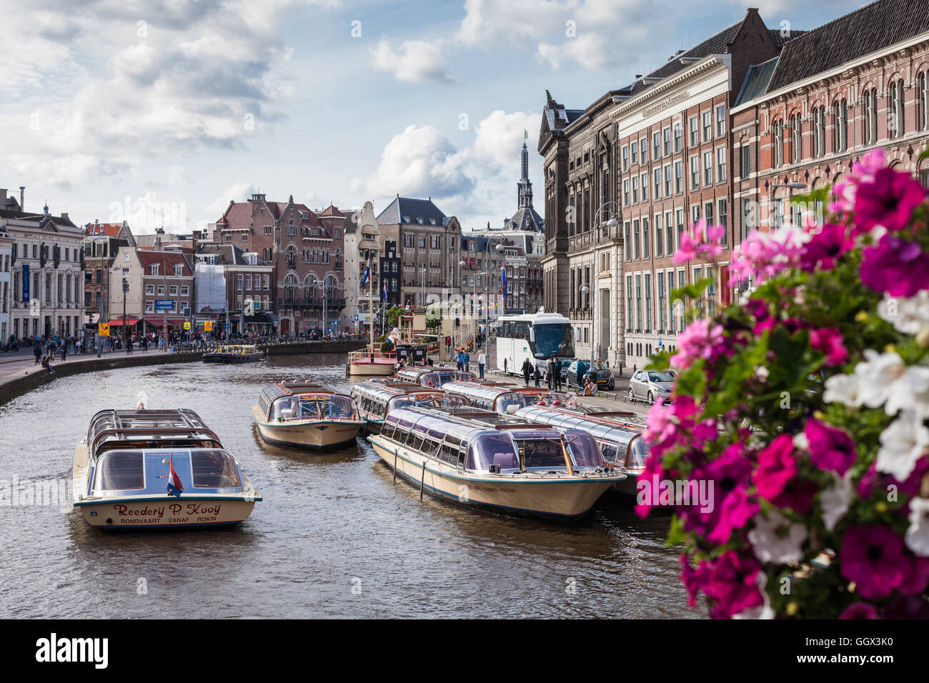 Riverboats on the canals in Amsterdam, Netherlands Stock Photo