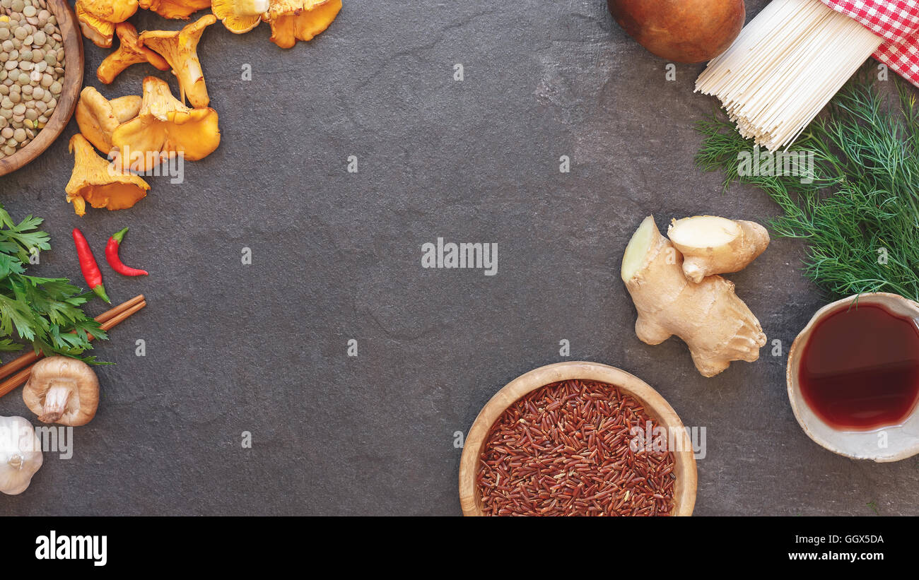 Selection of fresh food ingredients for cooking. Asian food concept, top view with space for text in the middle Stock Photo