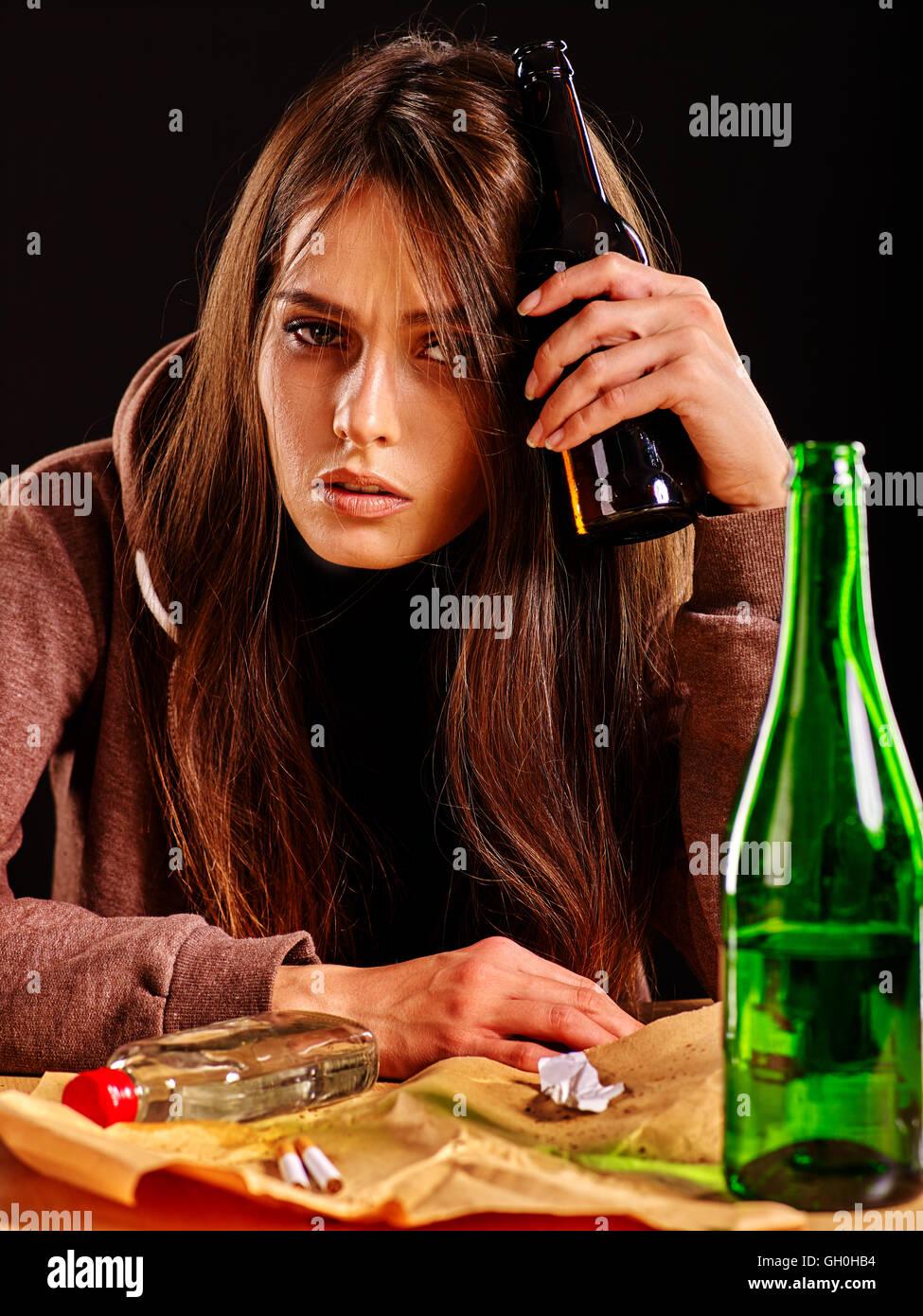 Girl in depression drink alcohol. Drinking habits Stock Photo Alamy