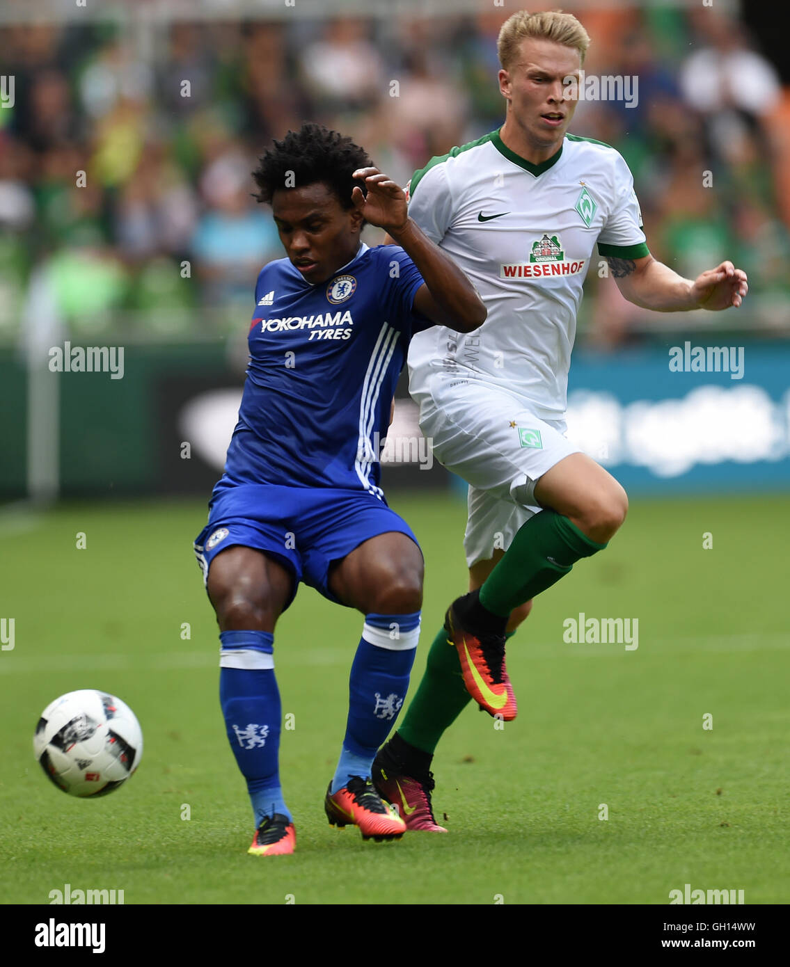 Bremen, Germany. 07th Aug, 2016. Chelsea's Willian Borges da Silva (l) in action against Werders Janek Sternberg during the test match game between Werder Bremen and FC Chelsea in Bremen, Germany, 07 August 2016. Photo: CARMEN JASPERSEN/DPA/Alamy Live News Stock Photo