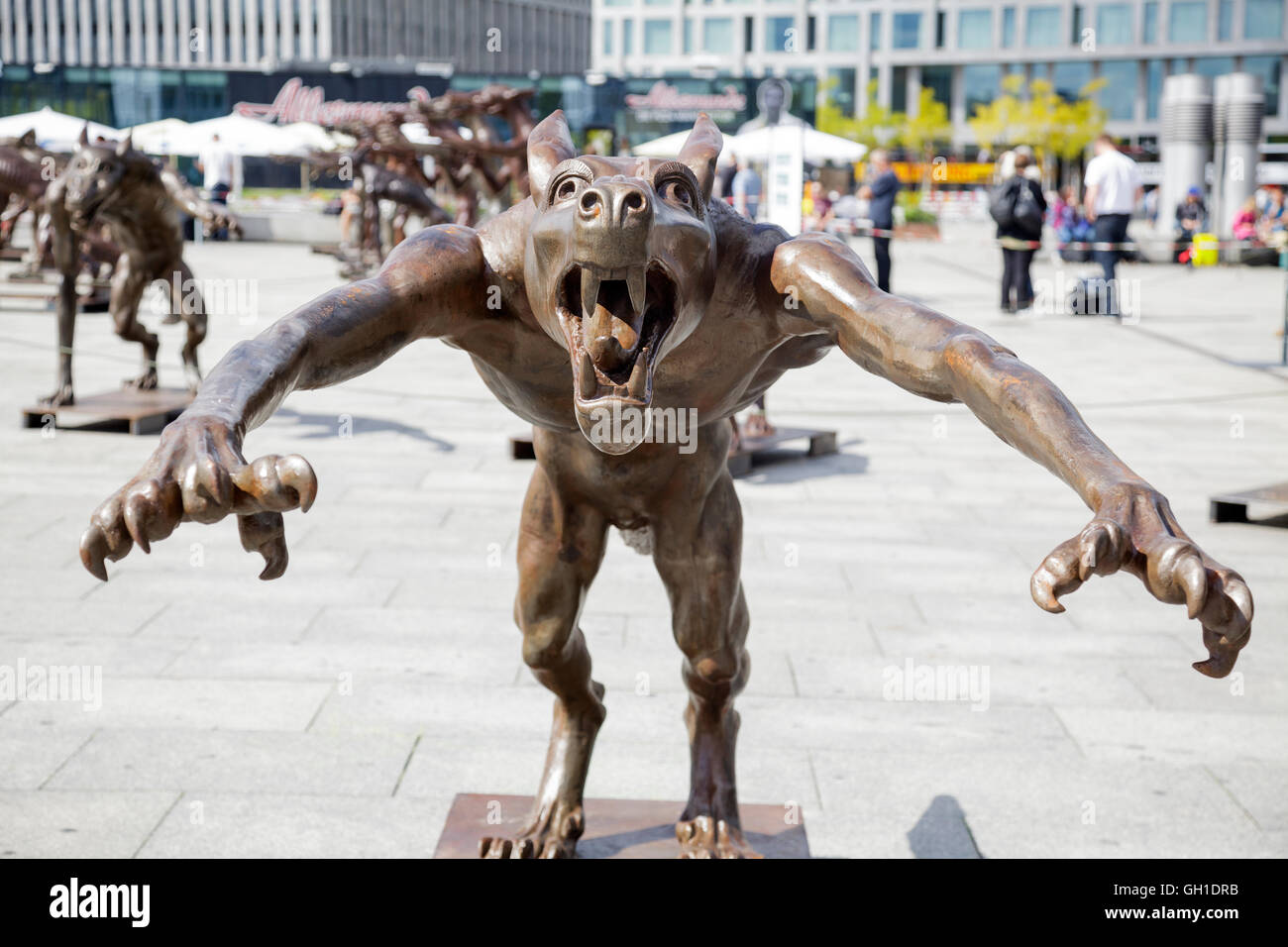 Berlin Germany. 7th August, 2016. From  6th August to 16th August 2016, a sculpture exhibition at Berlin Hauptbahnhof, main train station, called Die Wölfe sind zurück? The Wolves are back? The statues are by artist Rainer Opolka and are against hate and violence. The exhibition will be displayed in all German states. Credit:  Julie g Woodhouse/Alamy Live News Stock Photo