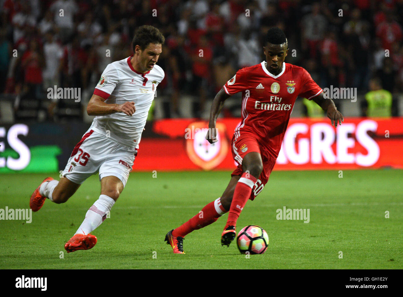 SL Benfica's Nelson Semedo vies for the ball with SC Braga's Vukcevic during the Supertaca Candido Oliveira football match in Aveiro, Portugal Stock Photo
