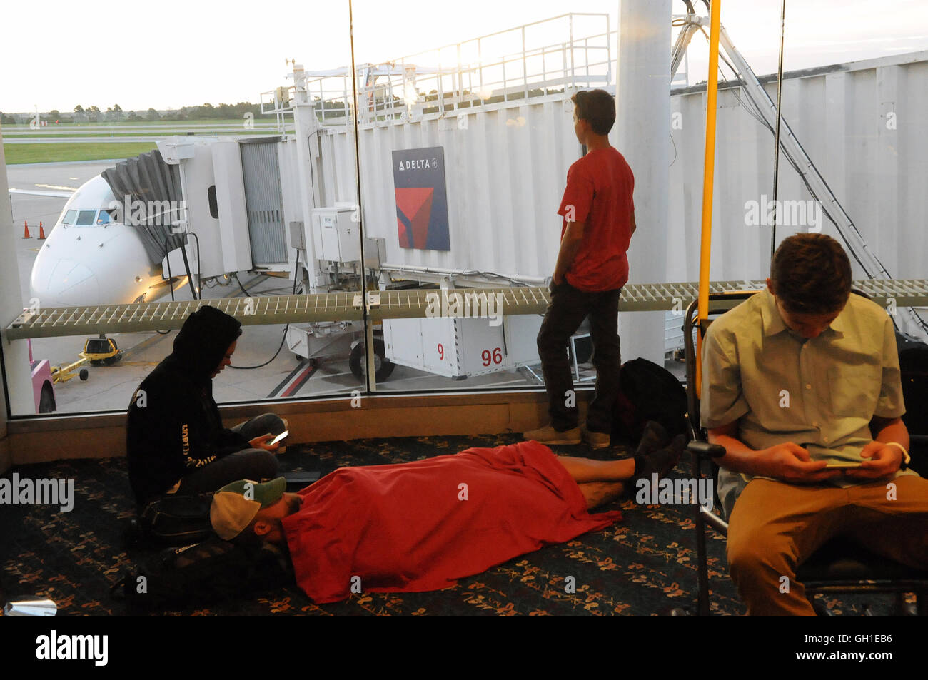 Orlando, Florida, USA. 8th August, 2016. Delta Airlines passengers wait at Orlando International Airport as all flights worldwide were grounded due to a computer system shutdown. Credit:  Paul Hennessy/Alamy Live News Stock Photo