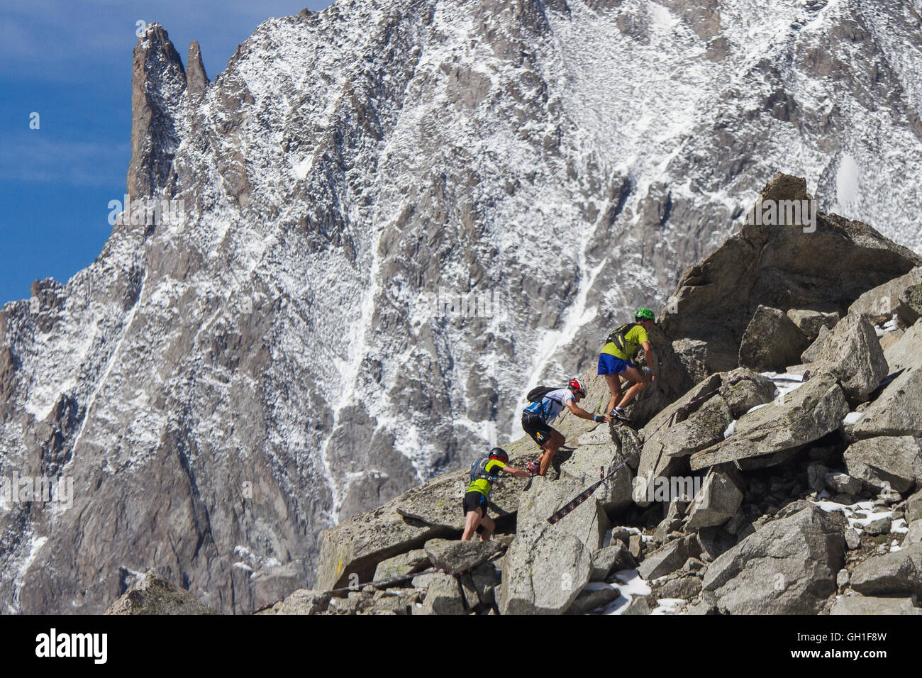 Participants in the X-Bionic Courmayeur Mont Blanc Sky Race ascend the 3,462 metre high Pointe Helbronner, a peak that is a part of Mont Blanc mountain range in Courmayeur, Italy, 06 August 2016. Photo: Silas Stein/dpa Stock Photo