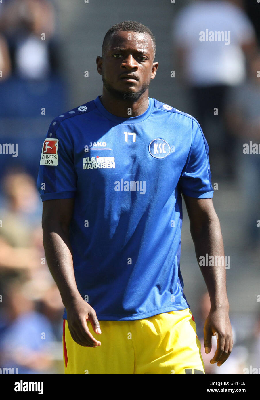 Bielefeld, Germany. 7th Aug, 2016. Karlsruhe's David Kinsombi warms up before the match of the 2nd Bundesliga Soccer match between Arminia Bielefeld and Karlsruher SC at Schueco Arena in Bielefeld, Germany, 7 August 2016. PHOTO: OLIVER KRATO/dpa/Alamy Live News Stock Photo