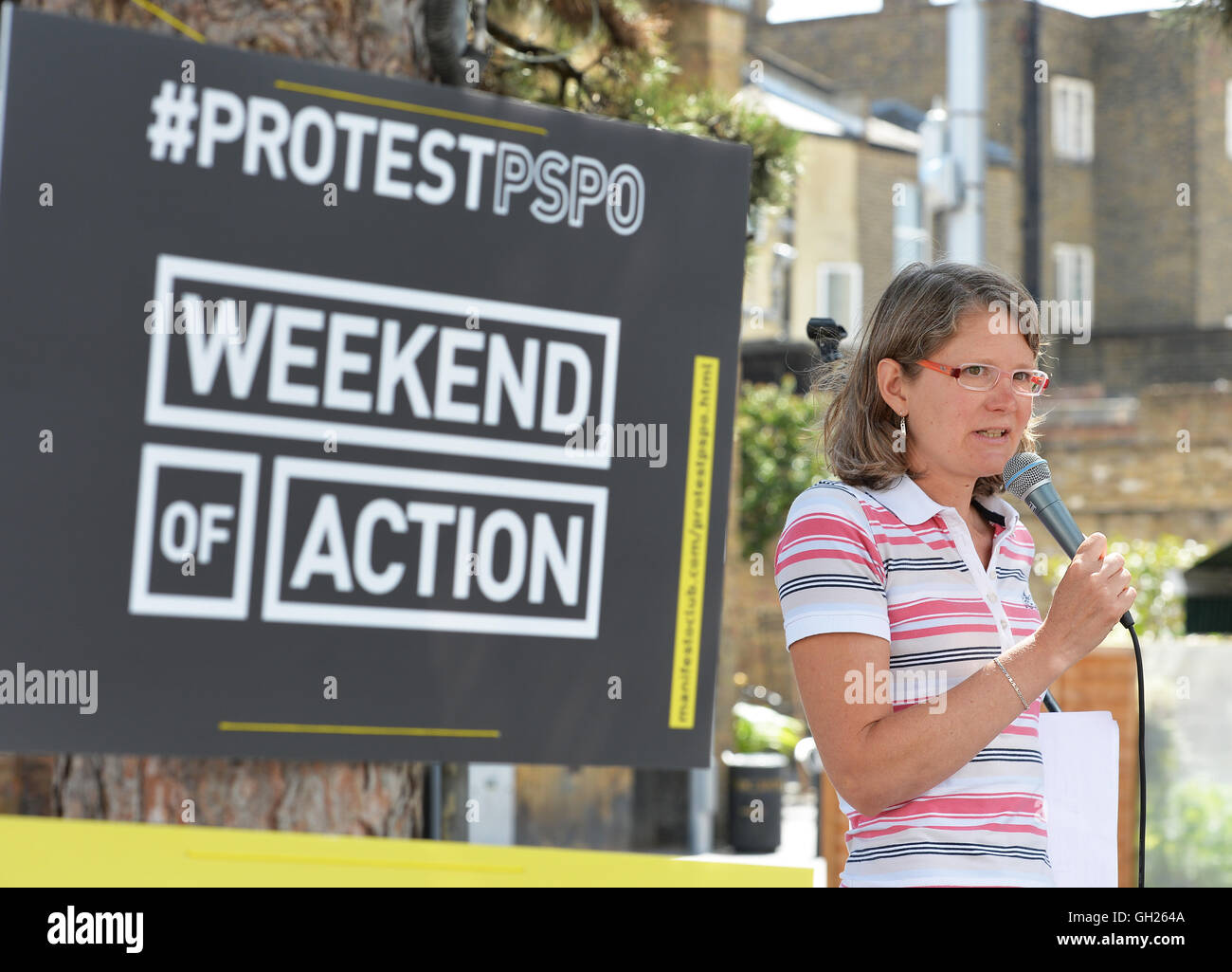 Josie Appleton from the activist group Manifesto Club speaks during a protest against new local council Public Space Protection Orders (PSPO), in Gillett Square Dalston, London. Stock Photo