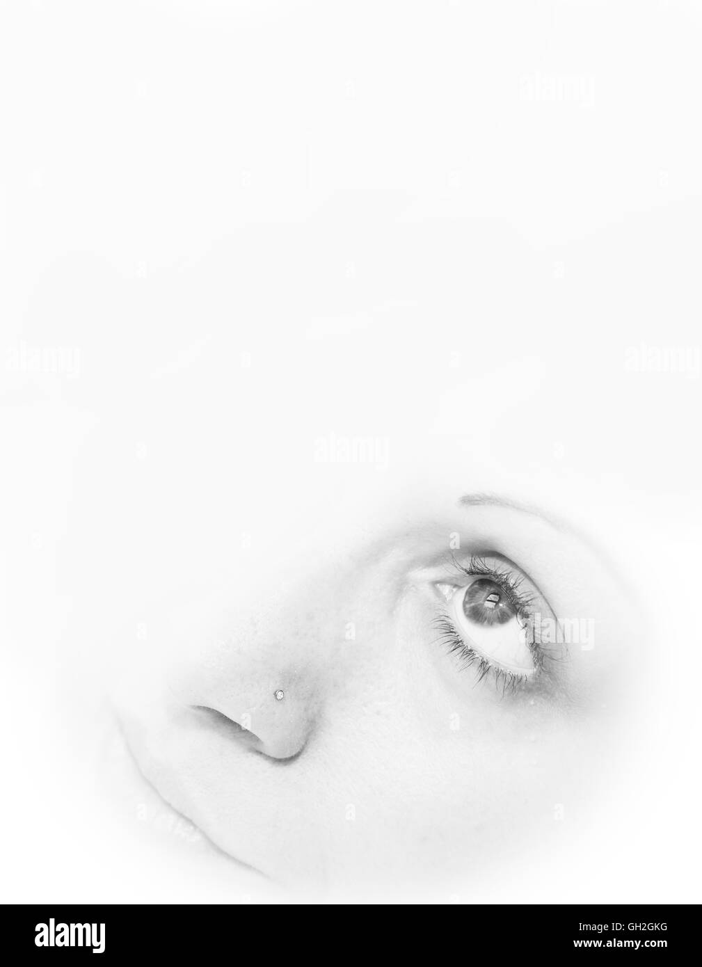 A womans face looking up with eyes open Stock Photo Alamy