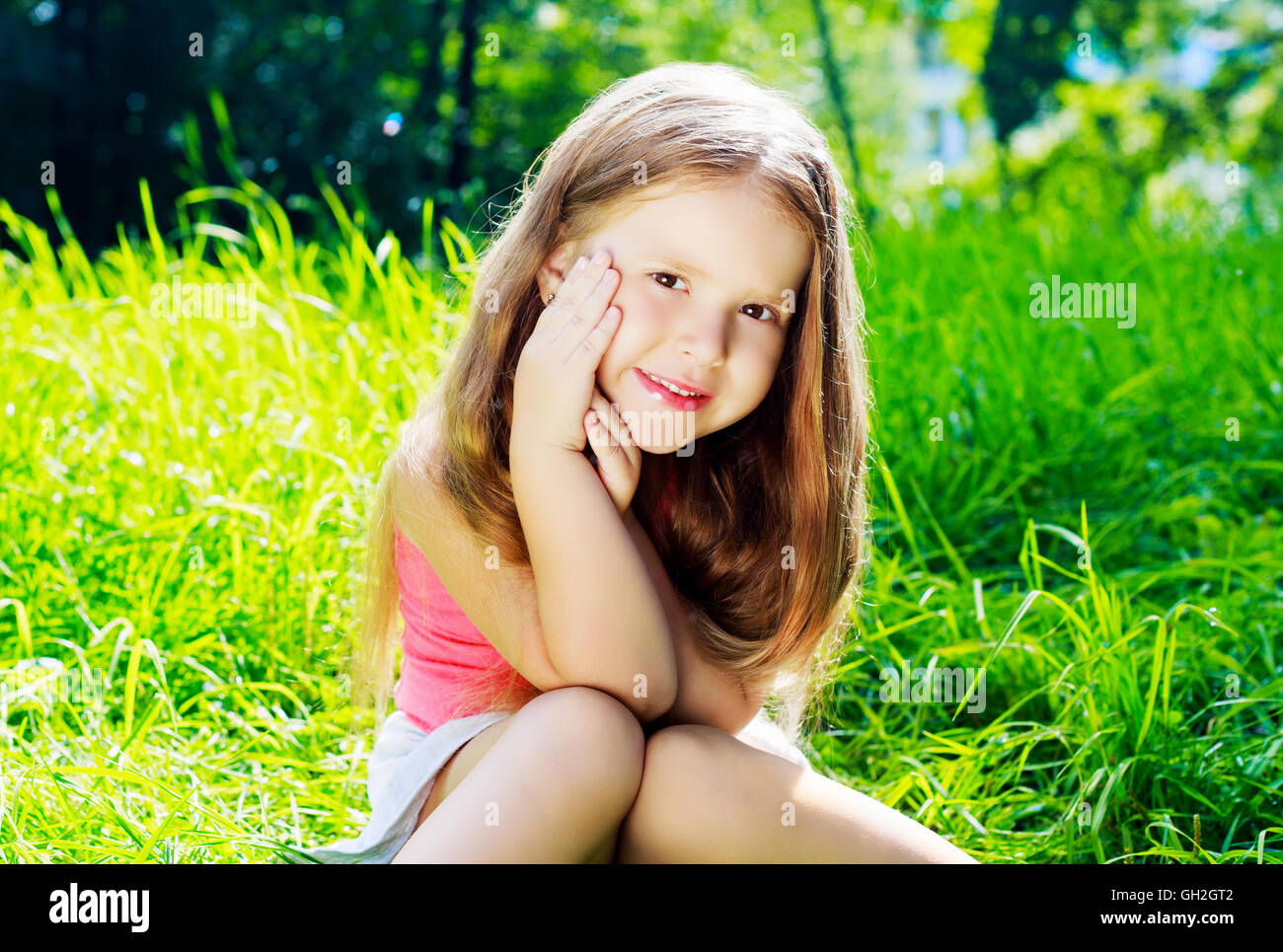happy smiling girl in the summer park Stock Photo - Alamy