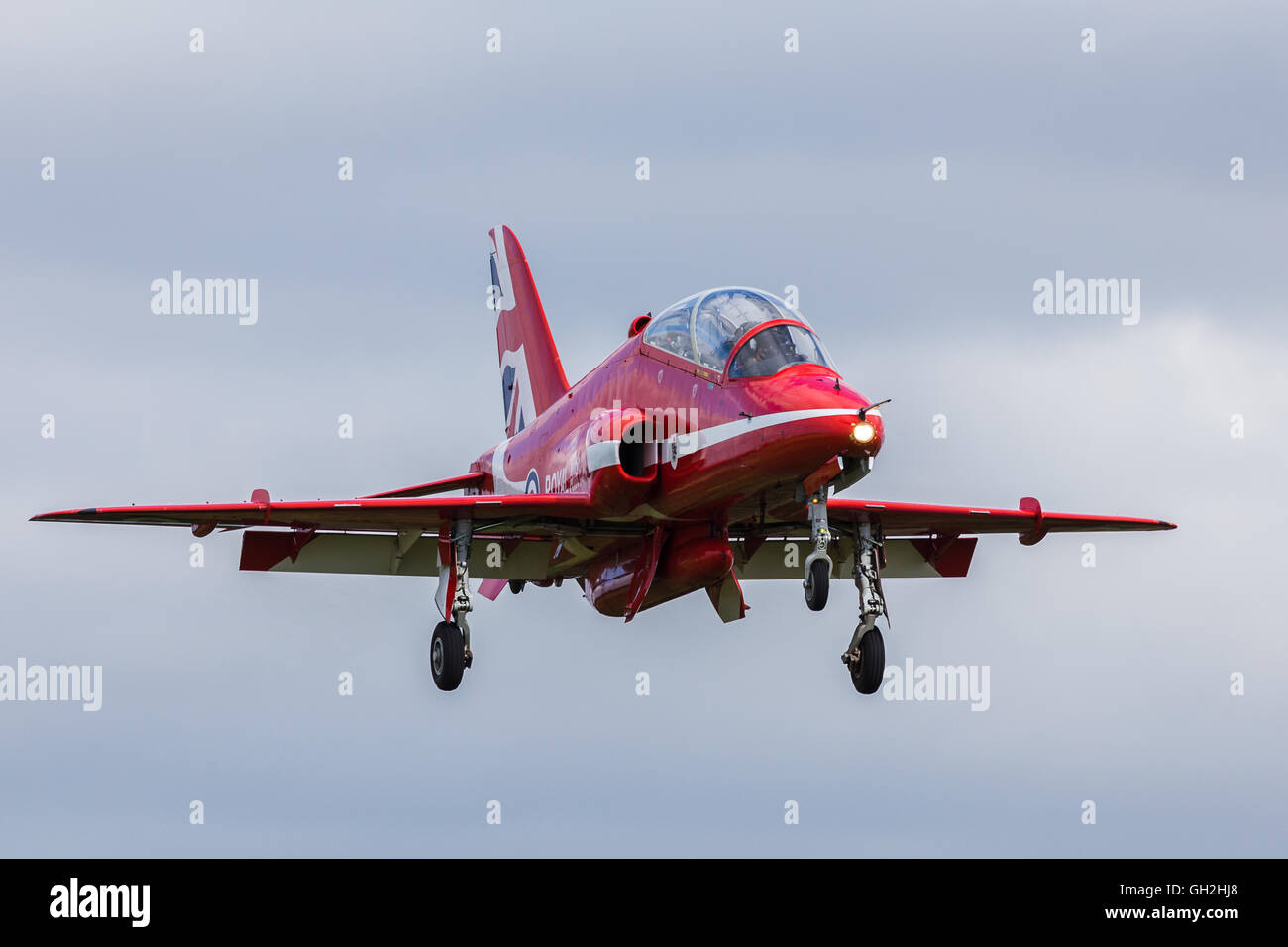 A Red Arrow from the RAF's display team fills the frame as it comes into land at Liverpool John Lennon airport. Stock Photo