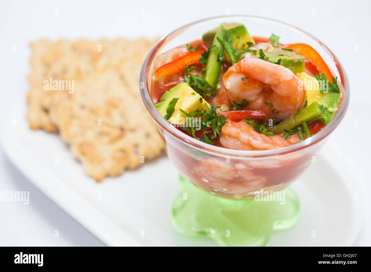 Shrimp cocktail served with crackers Stock Photo Alamy