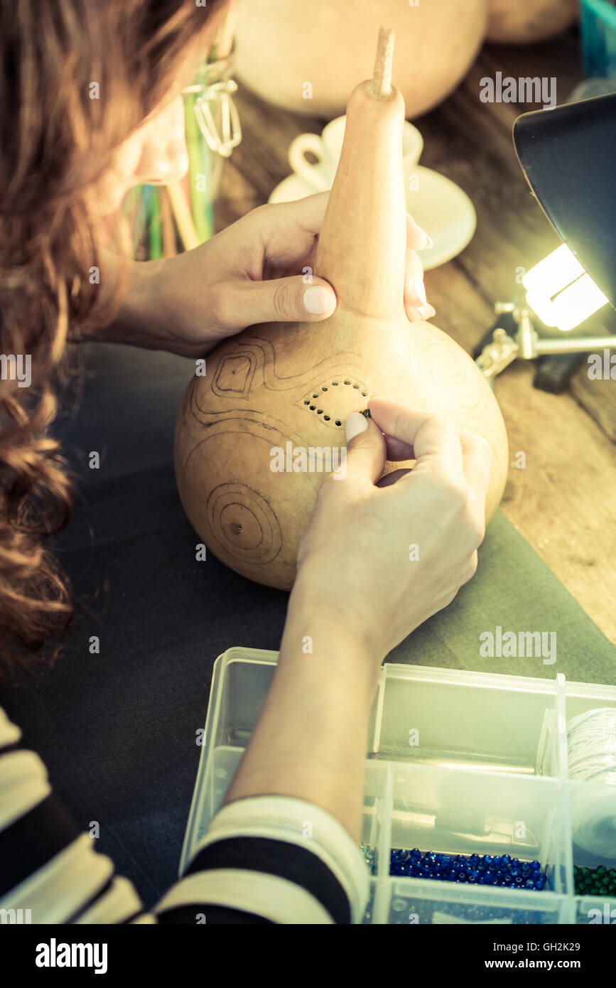 Ladies Making young woman making decorative items in workshop Stock Photo - Alamy