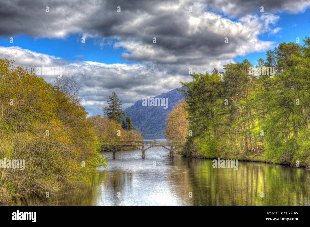 Fort Augustus Scotland UK River Oich in Scottish Highlands popular tourist village by Loch Ness in colourful HDR with bridge Stock Photo