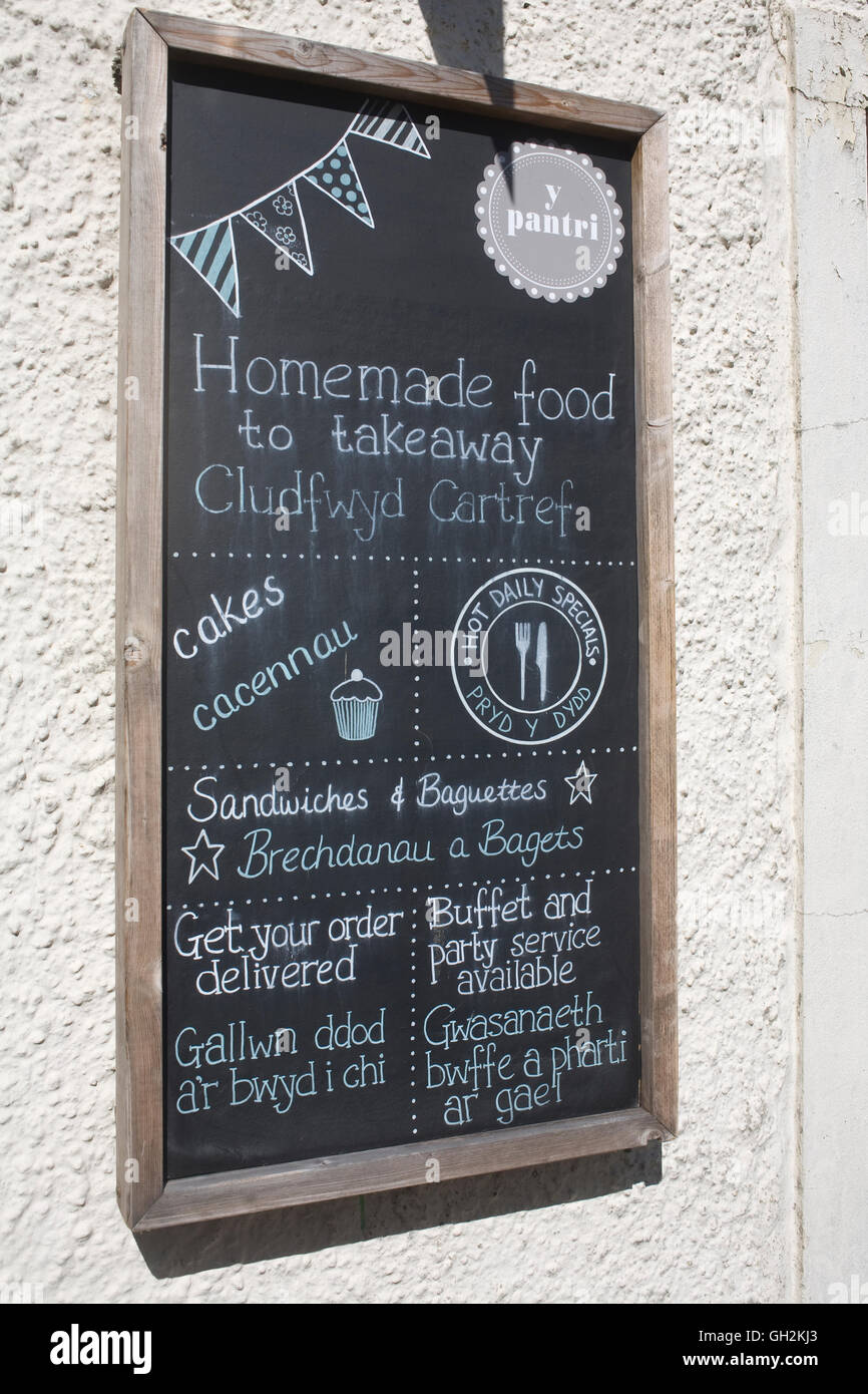 Bilingual menu on blackboard outside 'Y Pantri' cafe in Carmarthen town centre Stock Photo