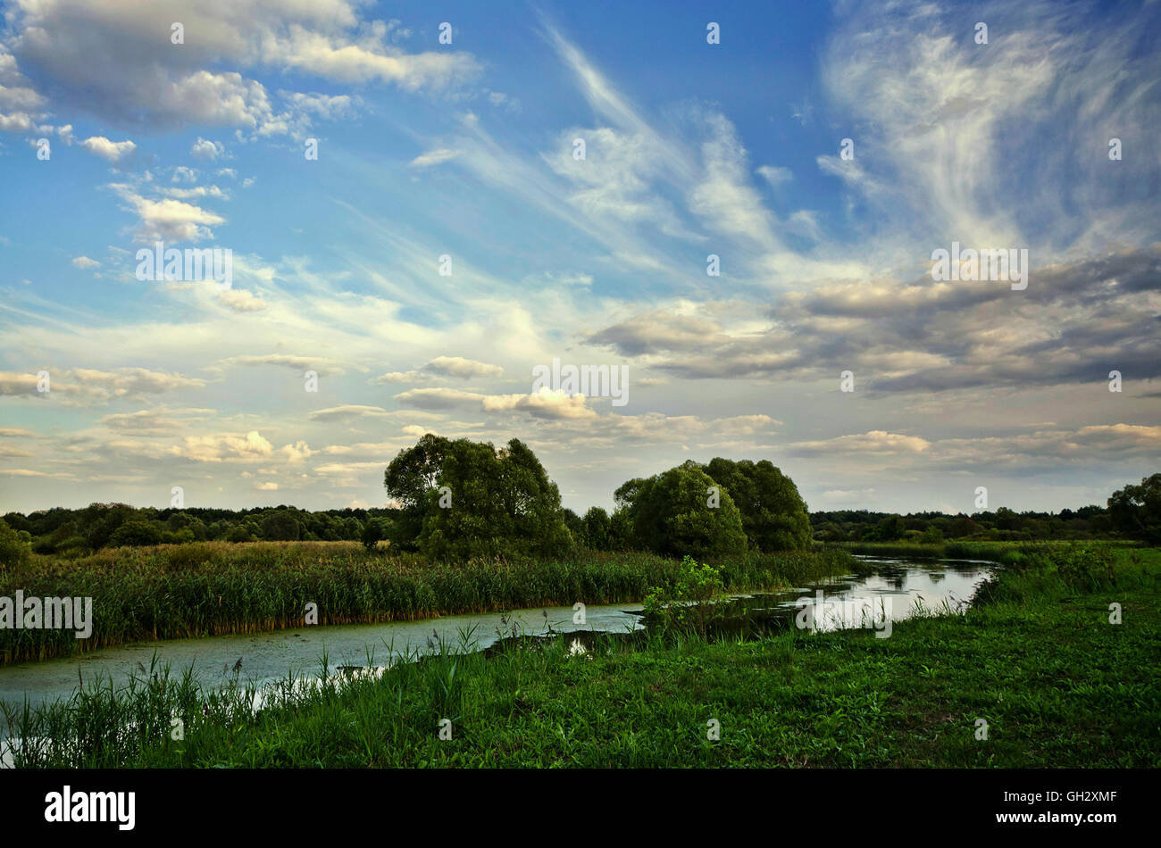Summer landscape with a river and sky Stock Photo - Alamy