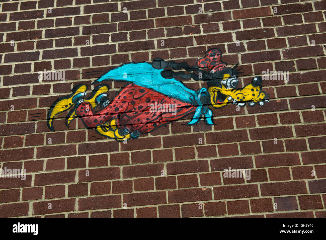 Graffiti of the Disney character Goofy within St Clements Hospital site in London's East End before the major redevelopment. Stock Photo