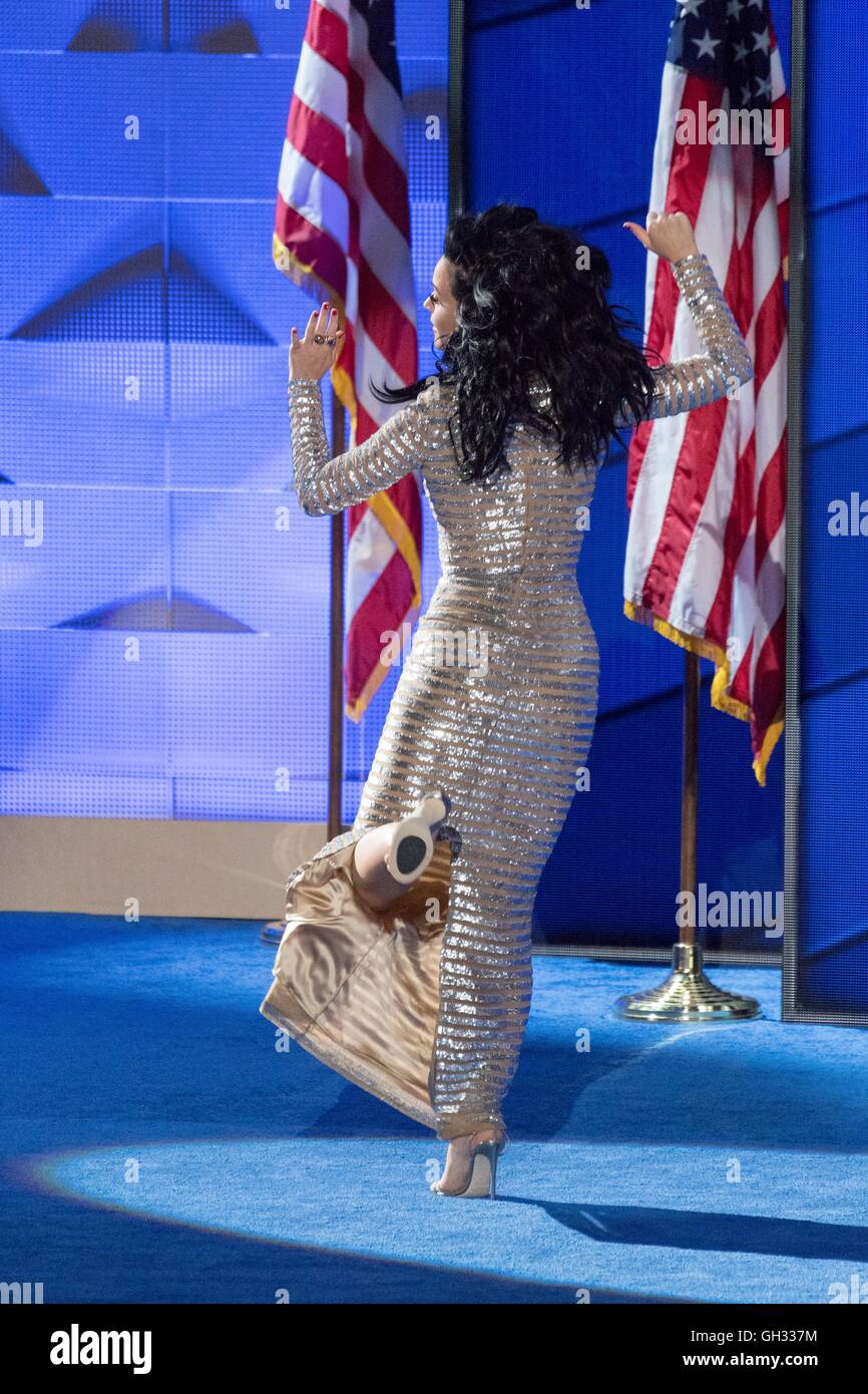 Singer Katy Perry does a kick jump as she leaves the stage after performing during the final day of the Democratic National Convention at the Wells Fargo Center July 28, 2016 in Philadelphia, Pennsylvania. Stock Photo