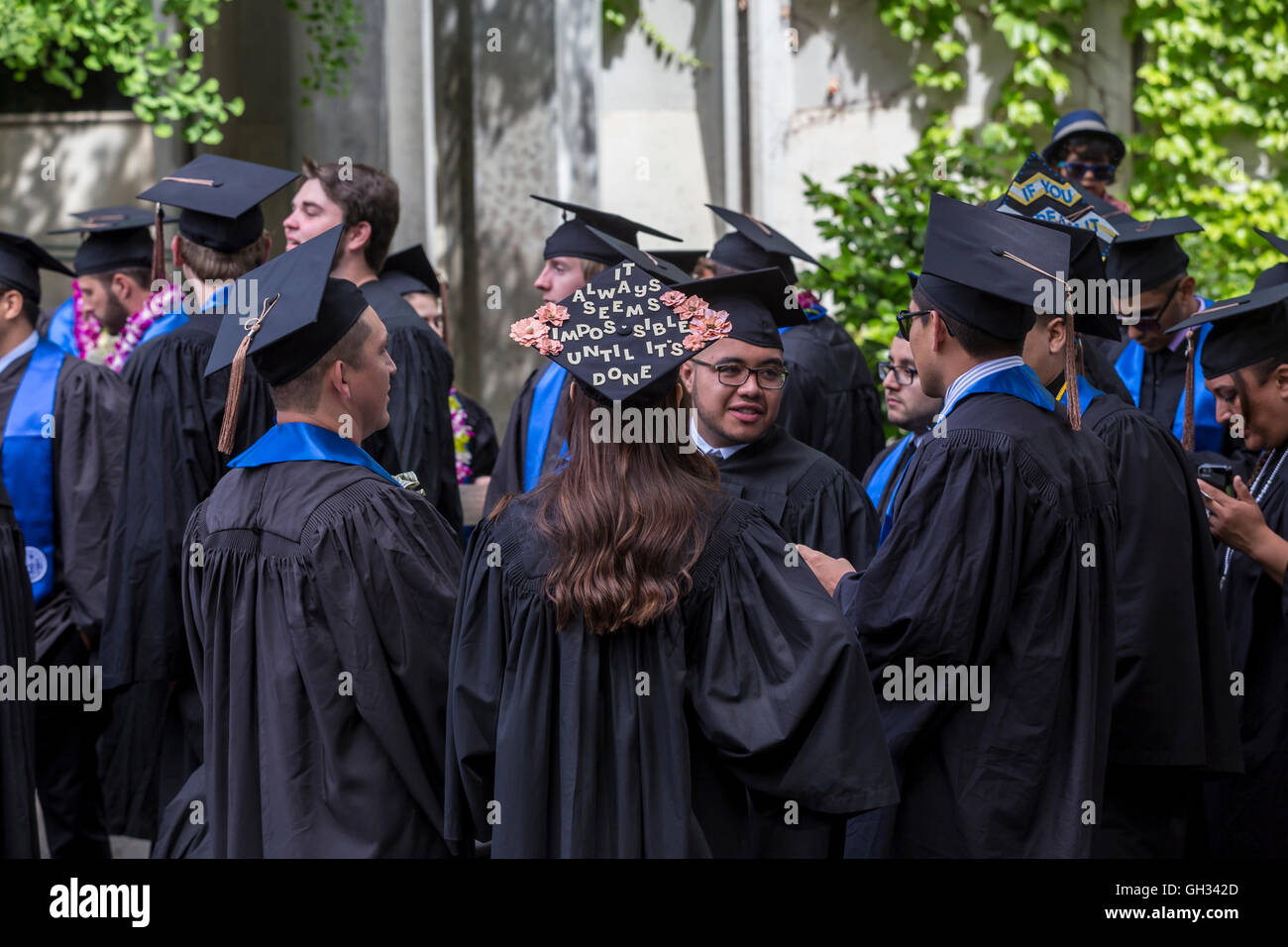university students attending graduation ceremony at Sonoma State University in Rohnert Park in Sonoma County in California United States Stock Photo