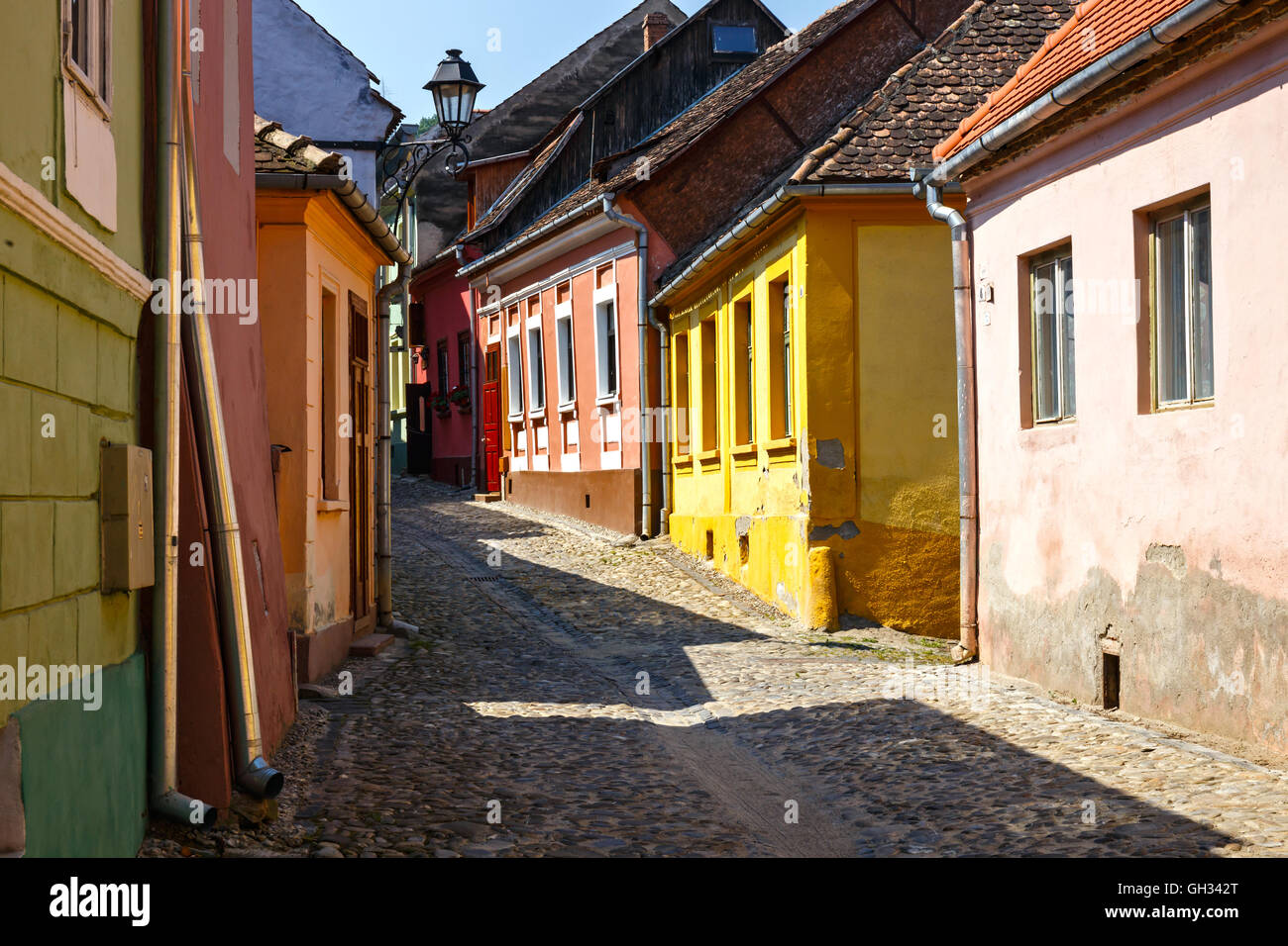 Medieval street view in Sighisoara, Romania Stock Photo - Alamy