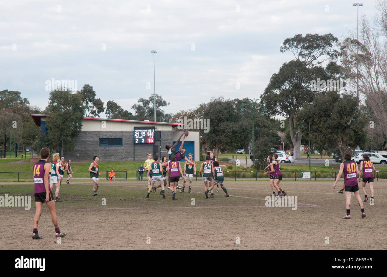 Amateur Australian Rules football game, Old Haileyburians versus UHS-VU Under 19s at Princes Park, Caulfield, Melbourne Stock Photo