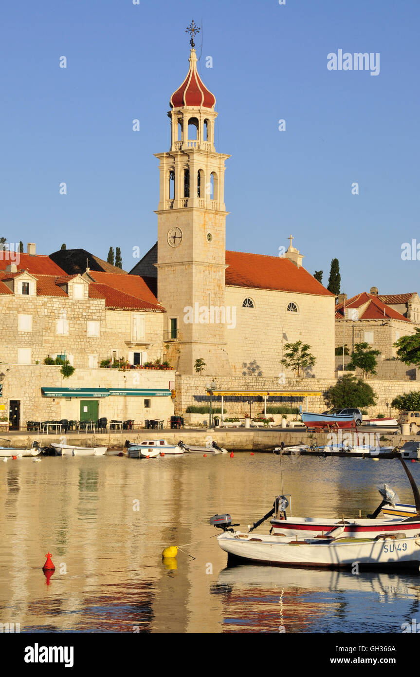 geography / travel, Croatia, fishing boat in the harbour of Sutivan in front of the church Sveti Ivan, Brac isle, Dalmatia, the Balkans, Additional-Rights-Clearance-Info-Not-Available Stock Photo