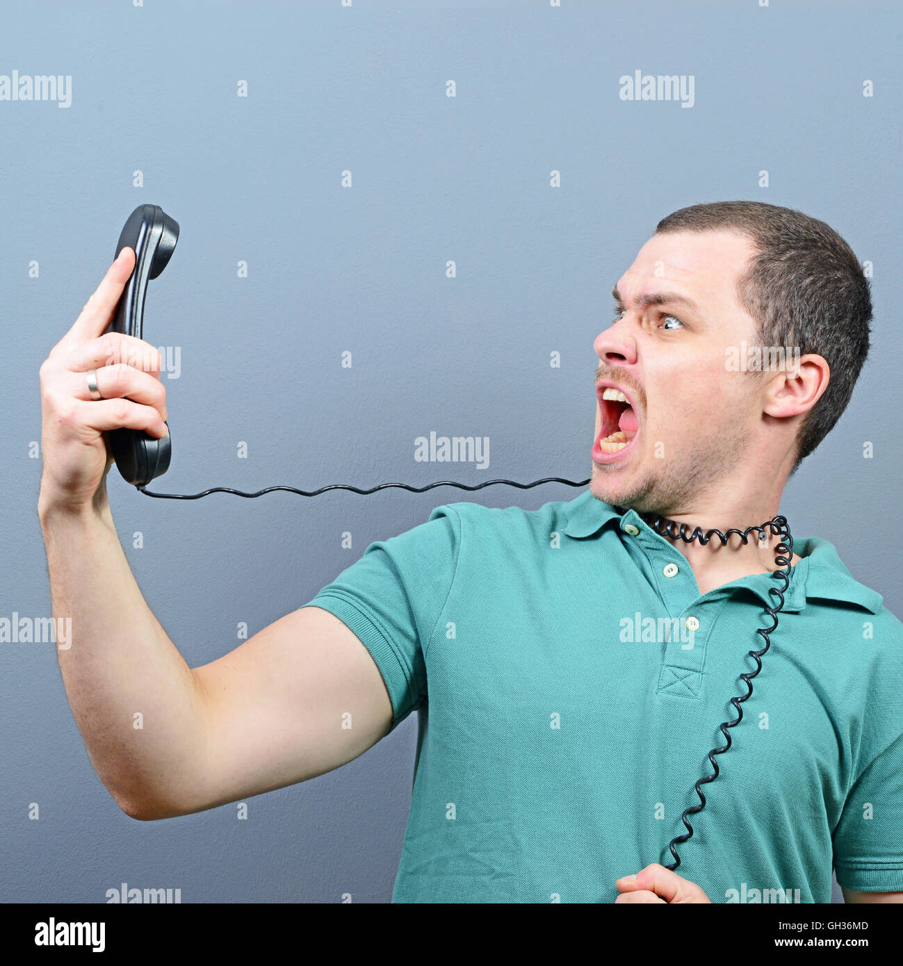 Man Having Unpleasant Conversation On Telephone Stock Photo Alamy