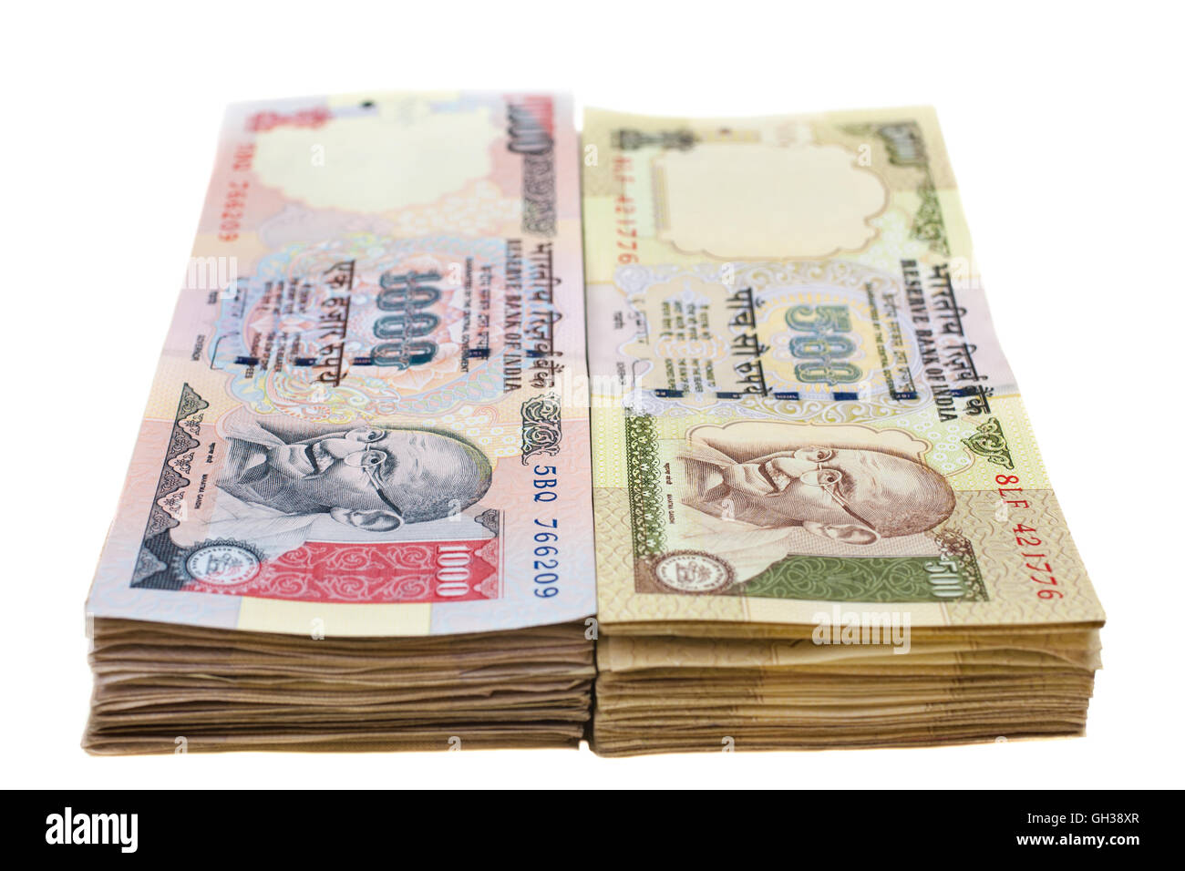 Stacks of thousand and five-hundred Indian rupee notes Stock Photo