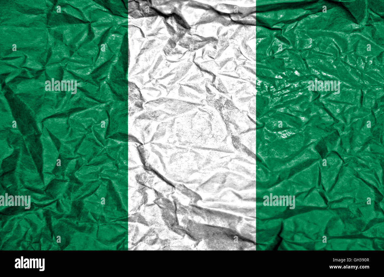 Nigeria vintage flag on old crumpled paper background Stock Photo - Alamy
