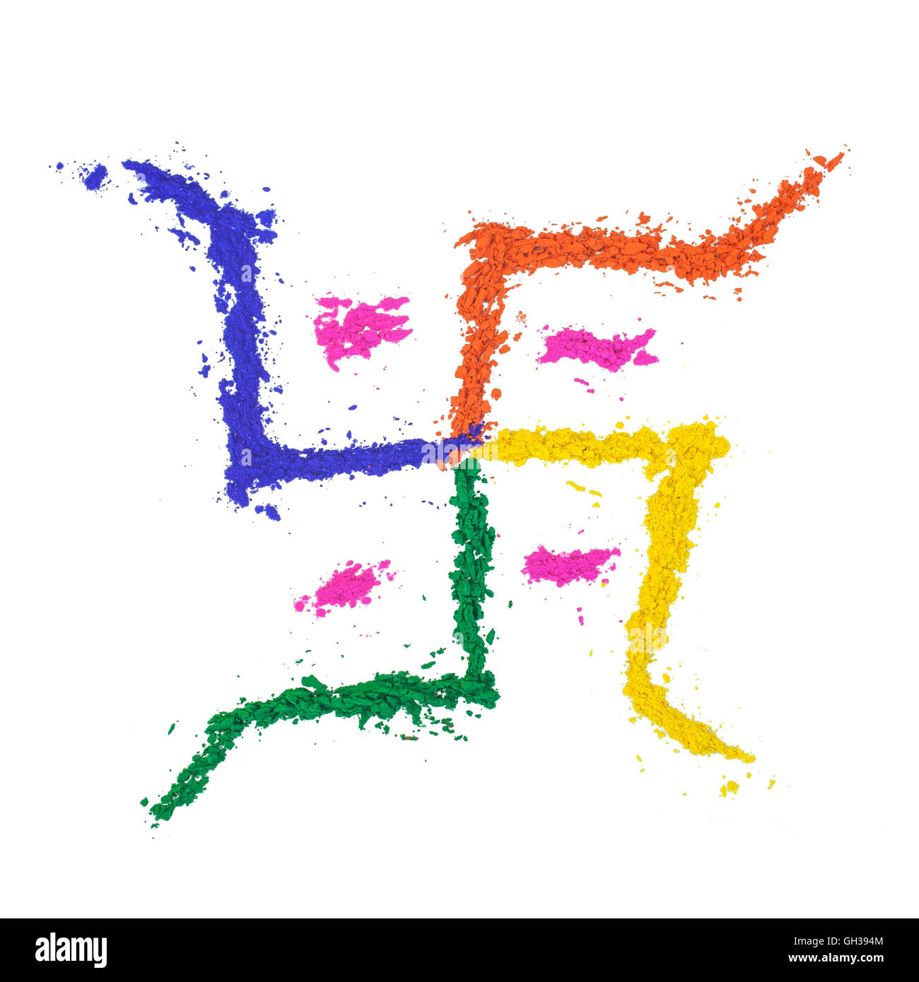 The auspicious swastika of India painted with dye powder and isolated on white. Stock Photo