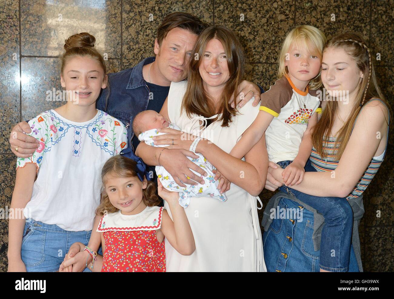 Jools And Jamie Oliver Leave The Portland Hospital In Central London With The Newest Addition To The Oliver Family A Baby Boy Who Has Yet To Be Named And Their Older Children