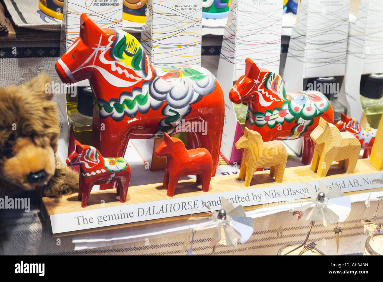 Stockholm, Sweden - May 5, 2016: Wooden toy horses, popular Swedish souvenir on the counter of touristic shop Stock Photo