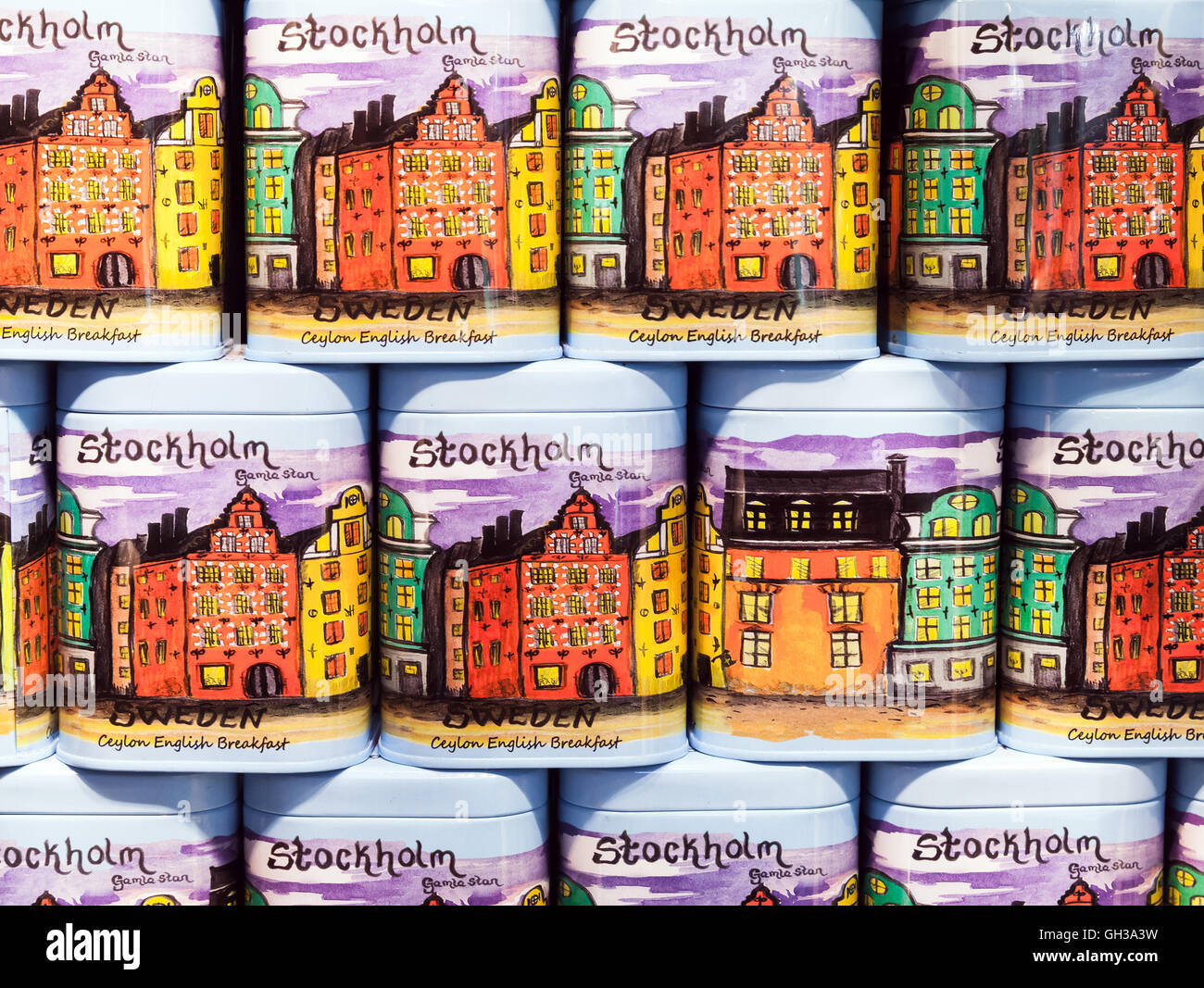 Stockholm, Sweden - May 5, 2016: Souvenir Tea in metal cans with colorful paintings stand on the counter of touristic shop Stock Photo