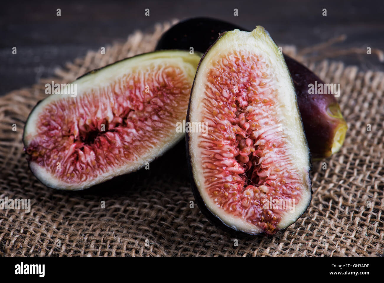 Ripe fruit figson sacking in the studio Stock Photo