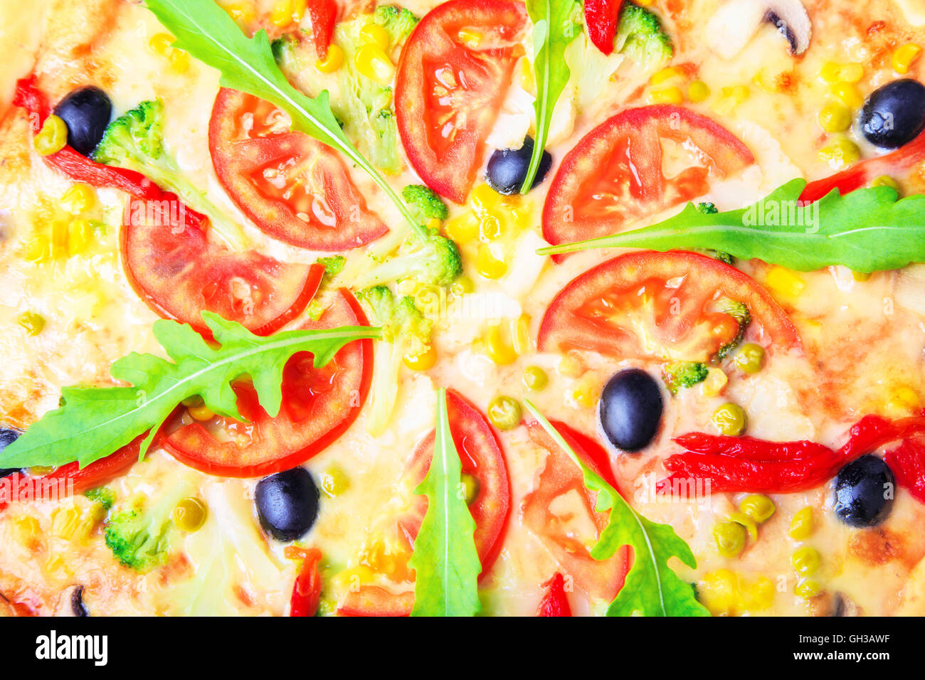 Delicious pizza with vegetables close-up, food background Stock Photo