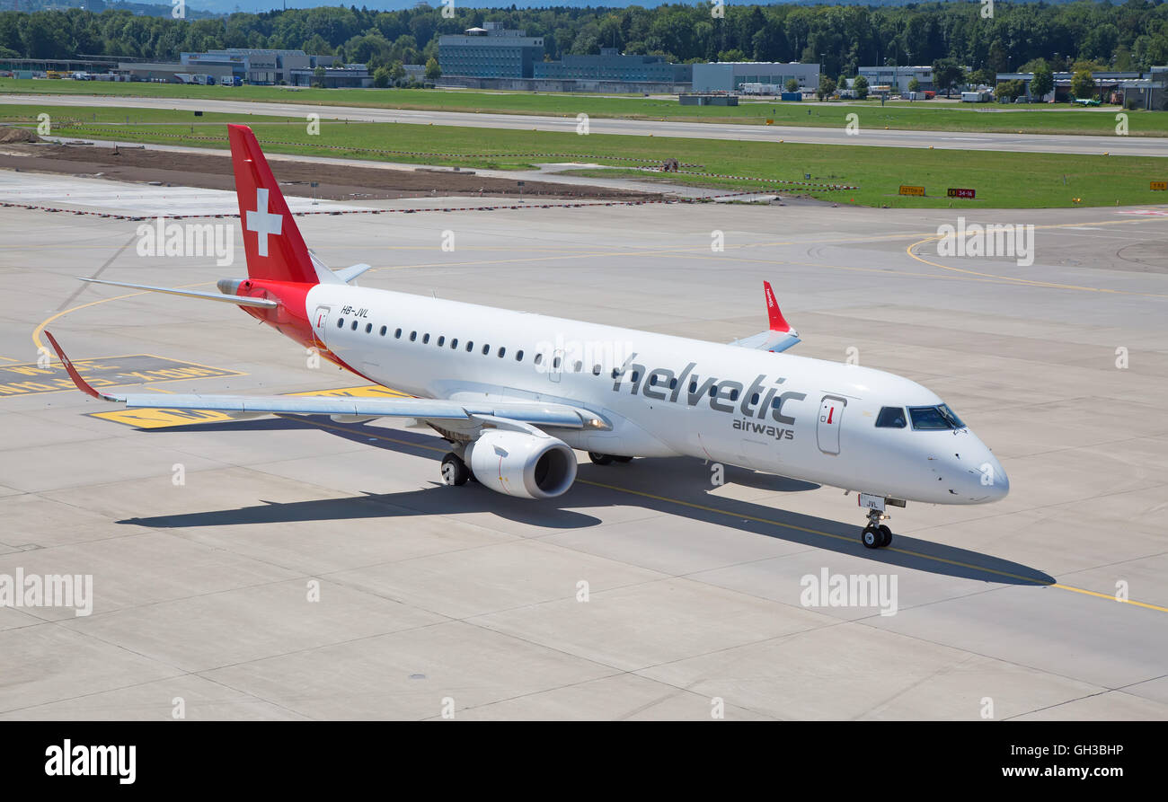 ZURICH - July 30:  Planes preparing for take off at Terminal A of Zurich Airport on July 30, 2016 in Zurich, Switzerland. Zurich Stock Photo