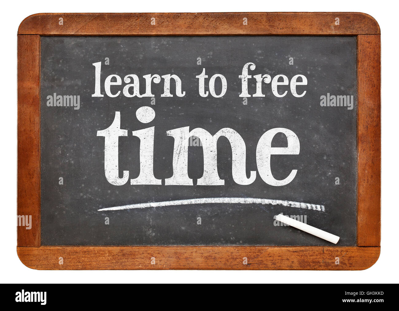 learn to free time - white chalk text on a vintage slate blackboard Stock Photo