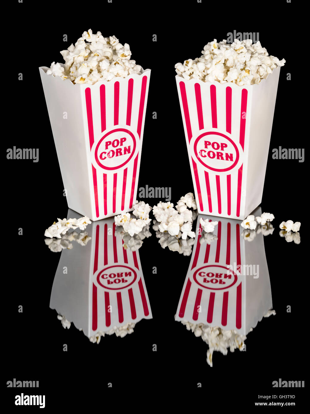 Two containers holding popcorn ready to eat Stock Photo Alamy
