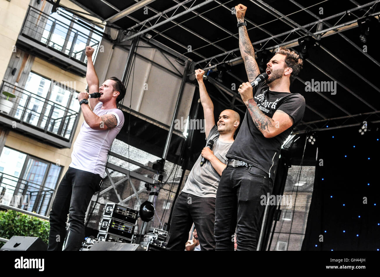 Sean Conlon, Scott Richardson and Ritchie Neville of pop band 5ive perform at Custom House Square, as part of Belfast Pride 2016 Stock Photo