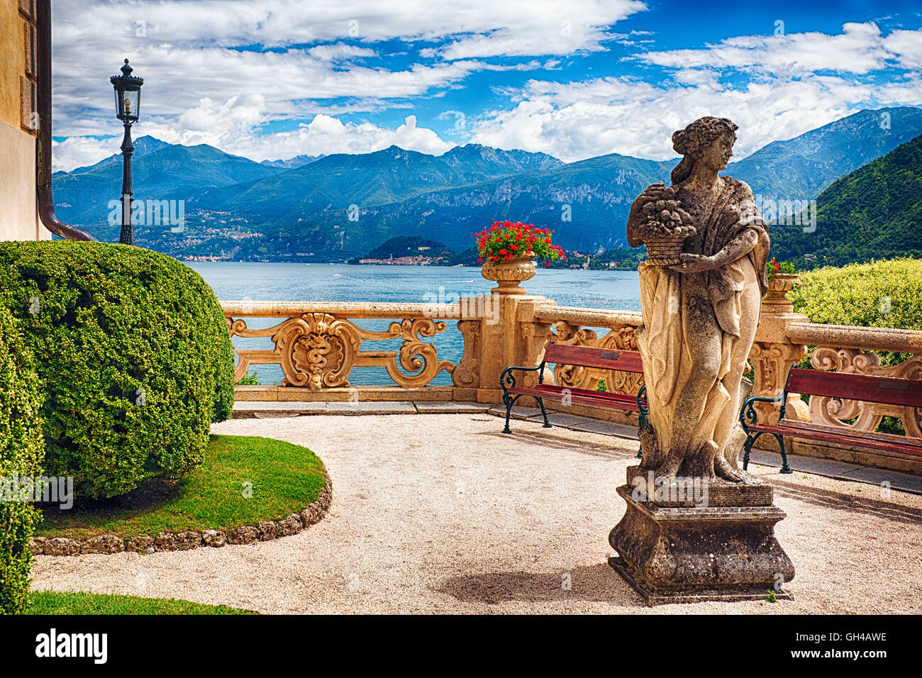 Lake View From a Villa Terrace, with a woman Statue in the foreground, Villa del Balbianello, Lenno-Como, Lombardy, Italy Stock Photo