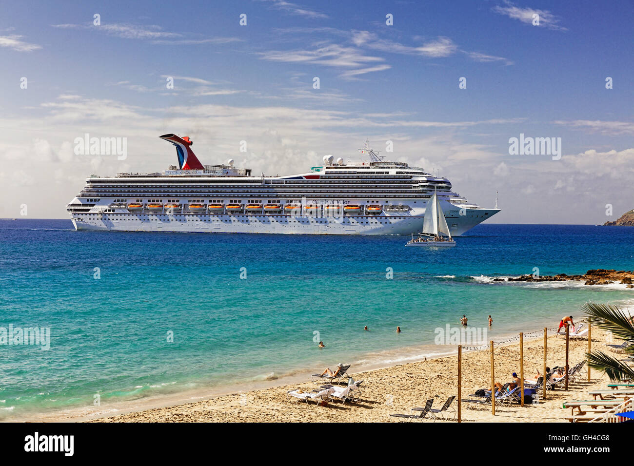 View of a Beach with a Cruise Ship in the Background, Frenchman Bay Reef, St Thomas, US  Virgin Islands Stock Photo