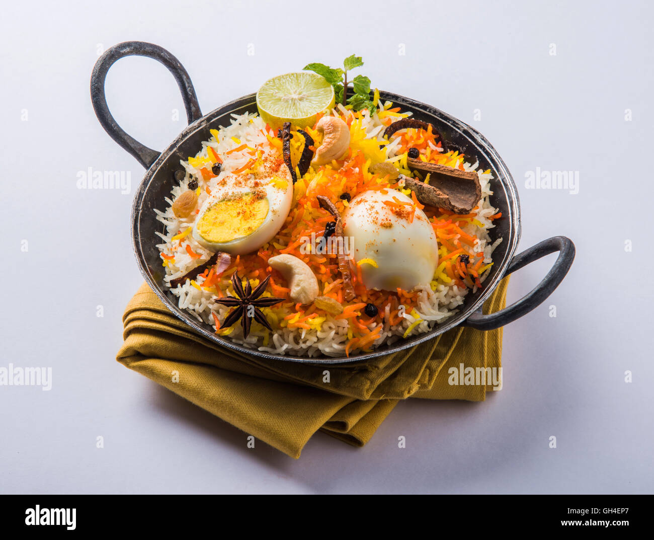 Basmati rice slowly cooked with Masala roasted egg and spices served in ...