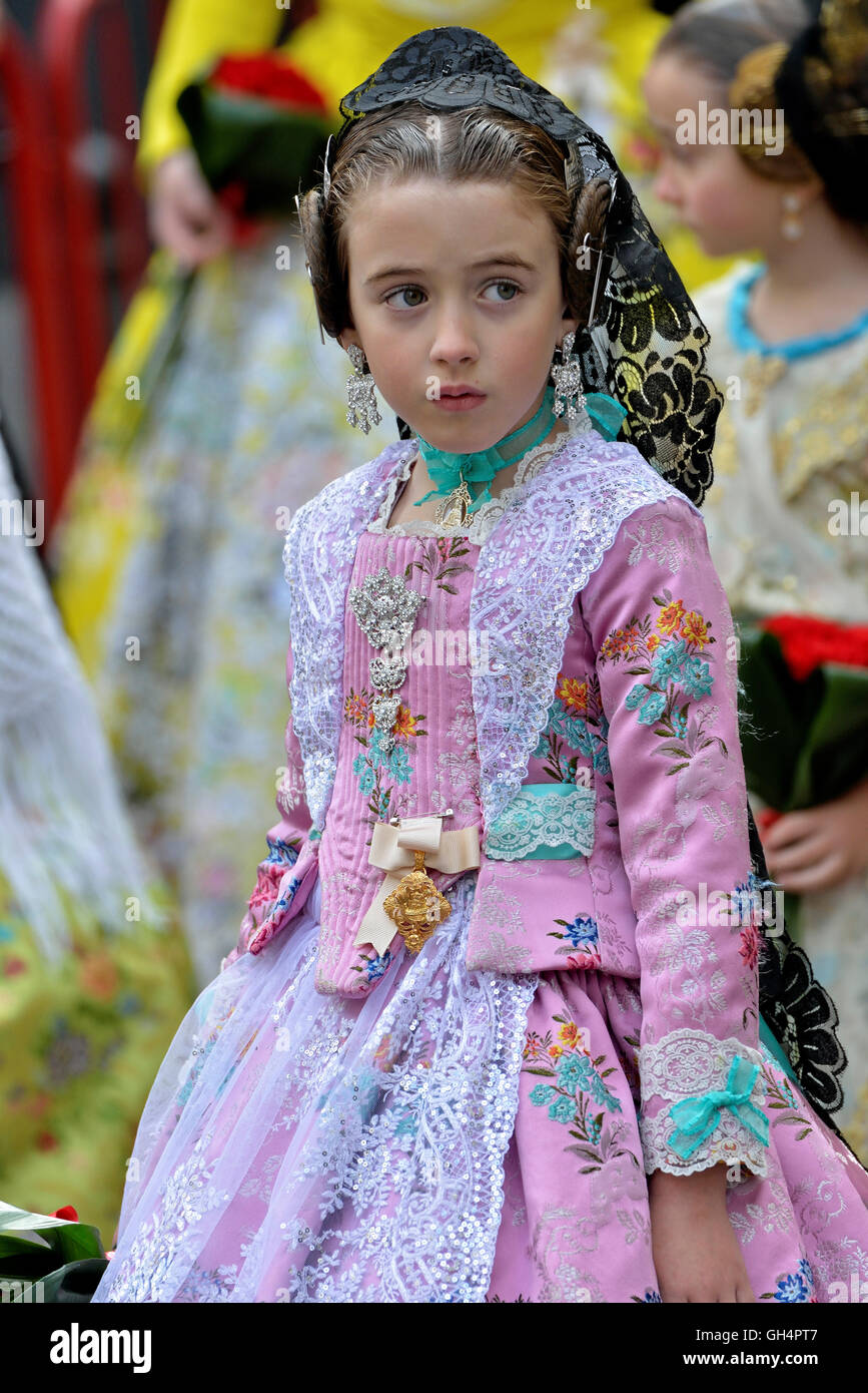 geography / travel, Spain, young girls in livery at the 'Blumengabe', traditional street parade at the Plaza de La virgen de Los Desamparados, Falles, Valencia, Additional-Rights-Clearance-Info-Not-Available Stock Photo