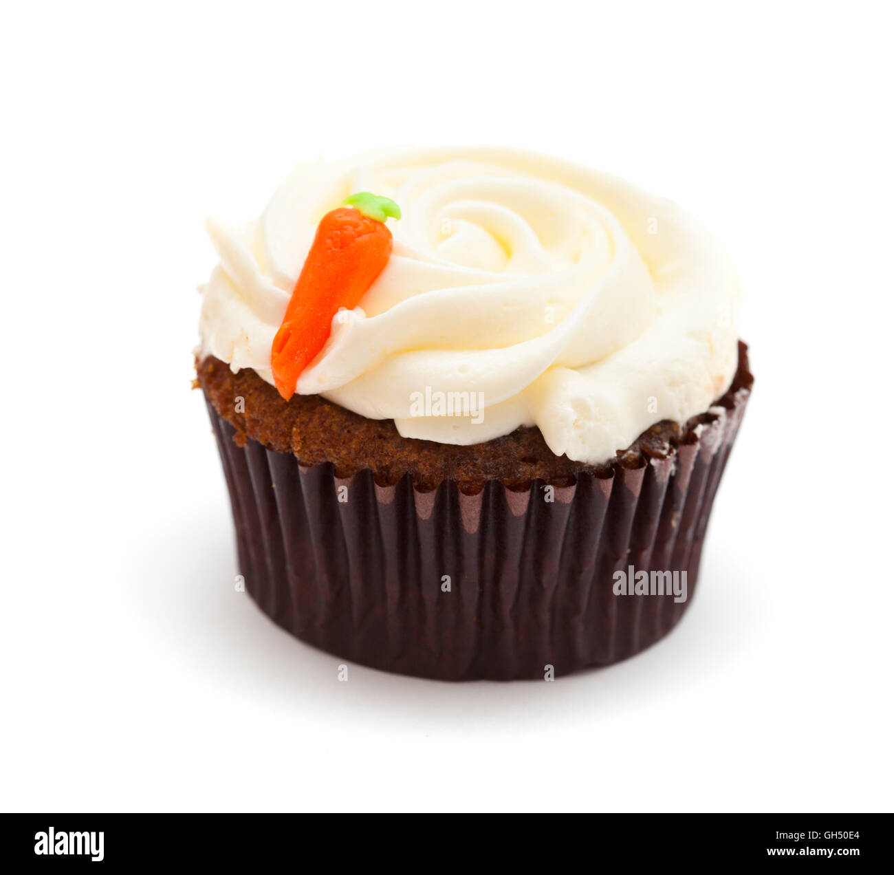 carrot cupcake with butter and sugar icing isolated on white Stock Photo