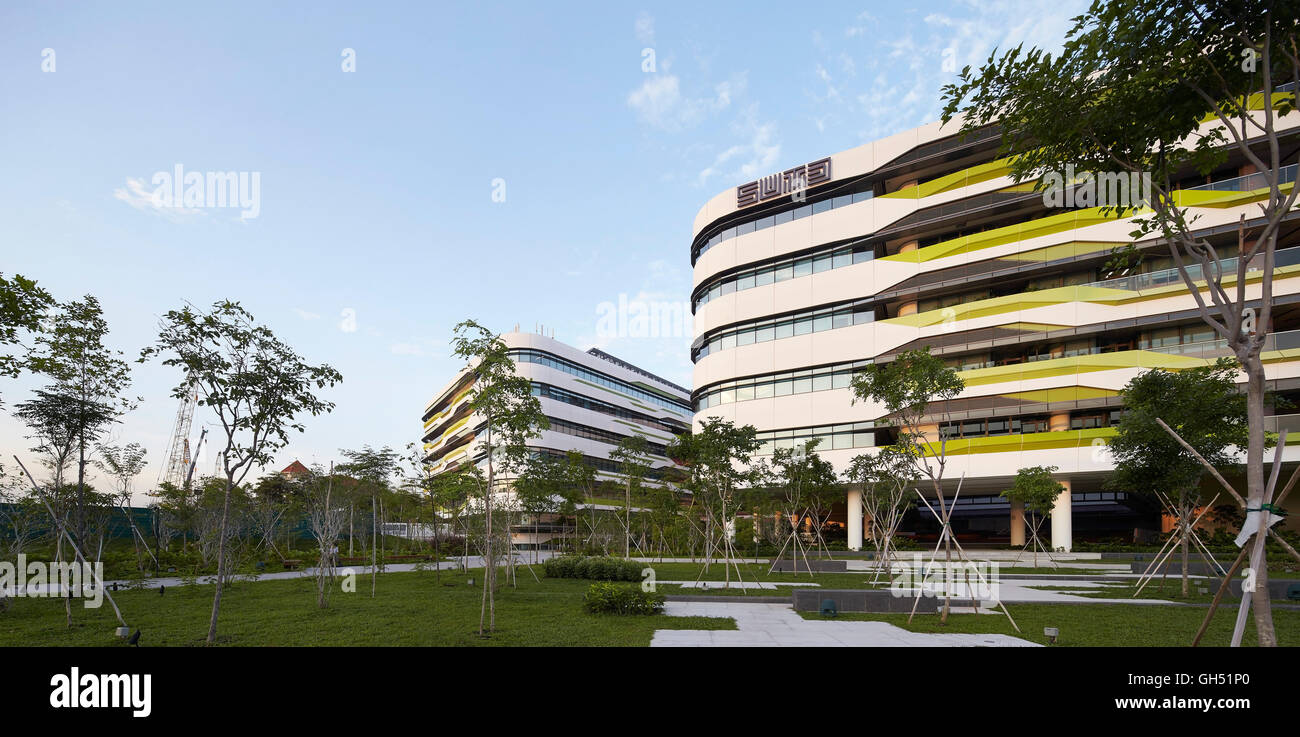 Campus garden with buildings beyond. Singapore University of Technology